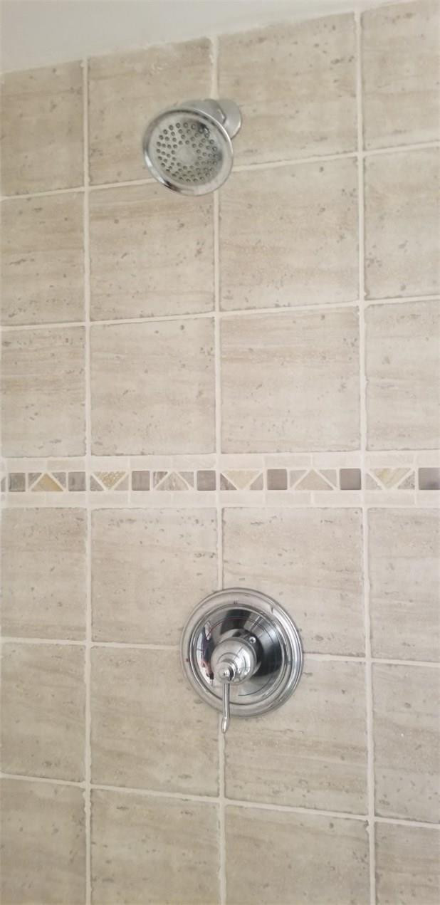 255 South Cypress Road, Unit 301 Pompano Beach, FL 33060 - Photo 31 of 42 a bathroom with a shower