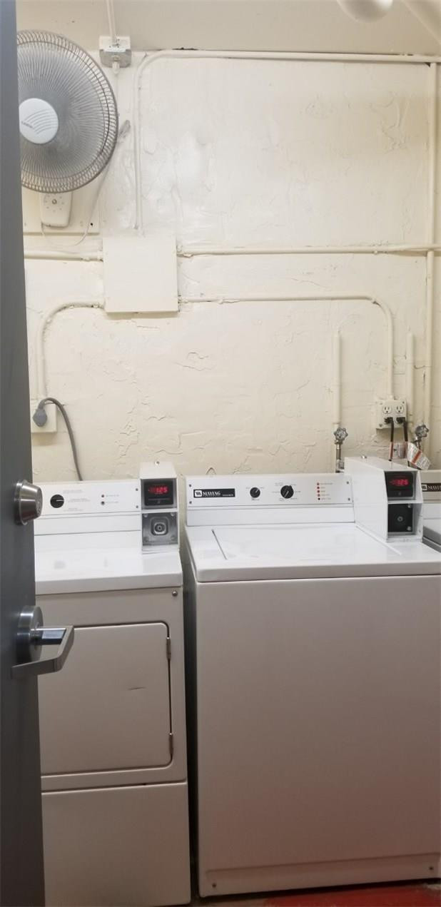 255 South Cypress Road, Unit 301 Pompano Beach, FL 33060 - Photo 34 of 42 a utility room with dryer and washer