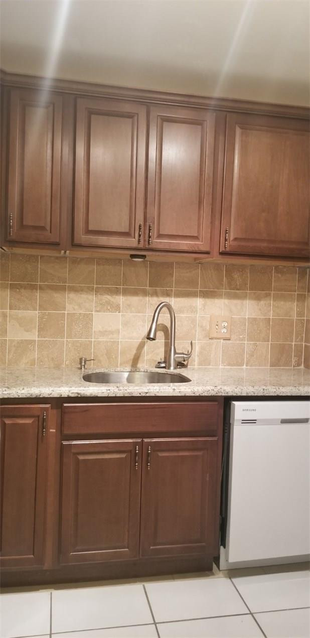 255 South Cypress Road, Unit 301 Pompano Beach, FL 33060 - Photo 5 of 42 a kitchen with granite countertop stainless steel appliances and sink