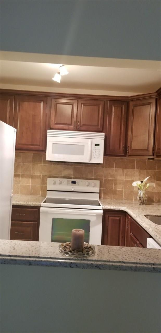 255 South Cypress Road, Unit 301 Pompano Beach, FL 33060 - Photo 7 of 42 a view of a kitchen sink