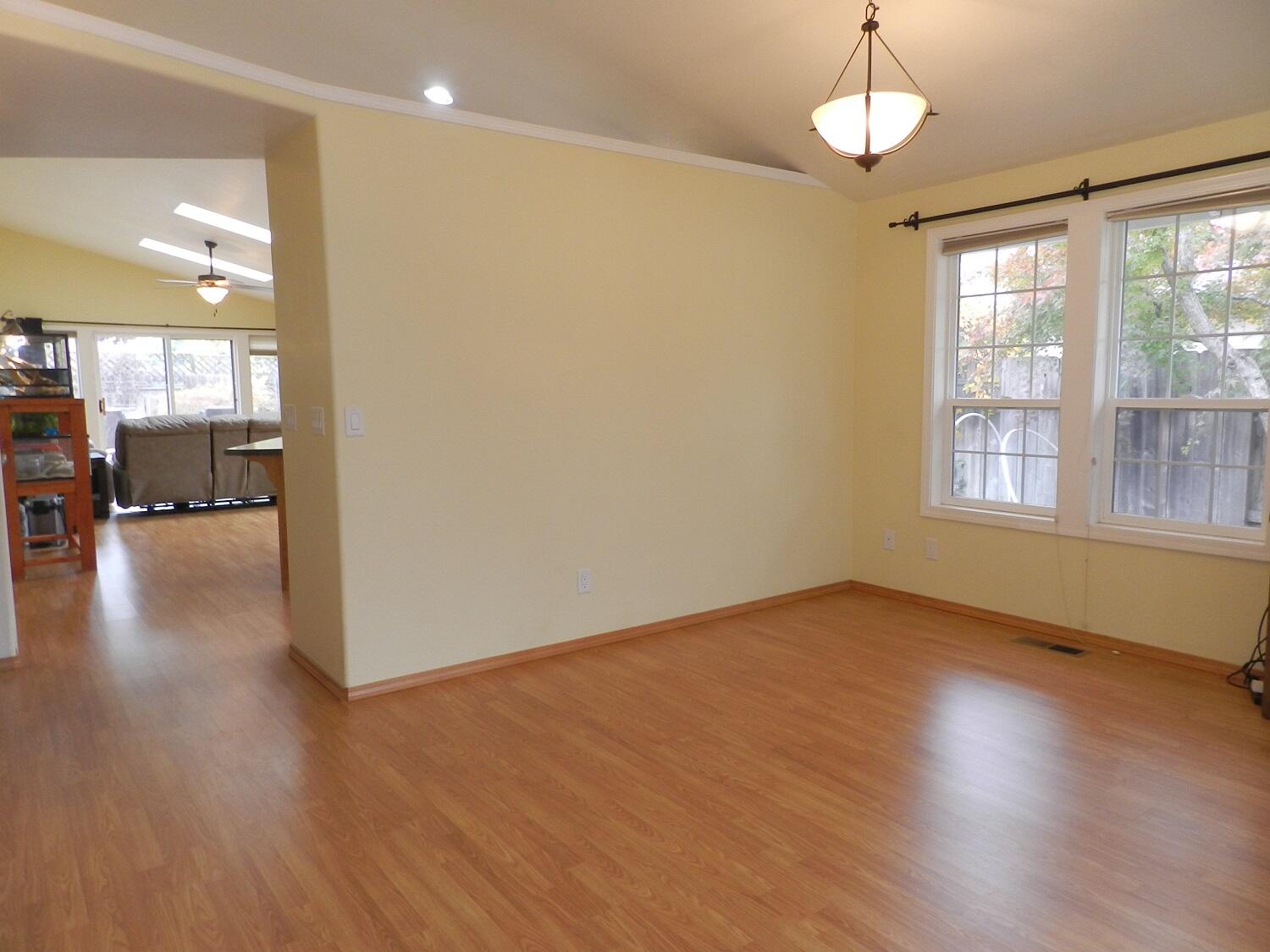 648 Benjamin Way Phoenix, OR 97535 - Photo 13 of 29 a view of a livingroom with wooden floor