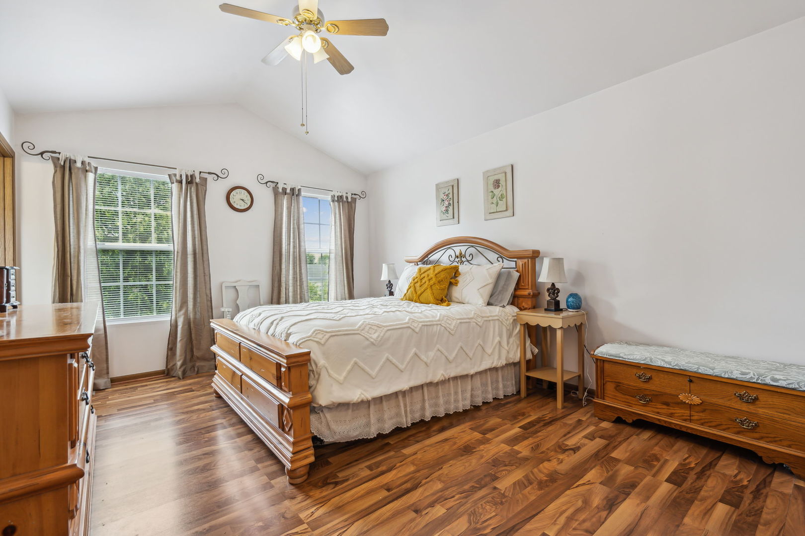 238 Ironbark Way Bolingbrook, IL 60440 - Photo 11 of 21 a bedroom with a bed lamp and a large window