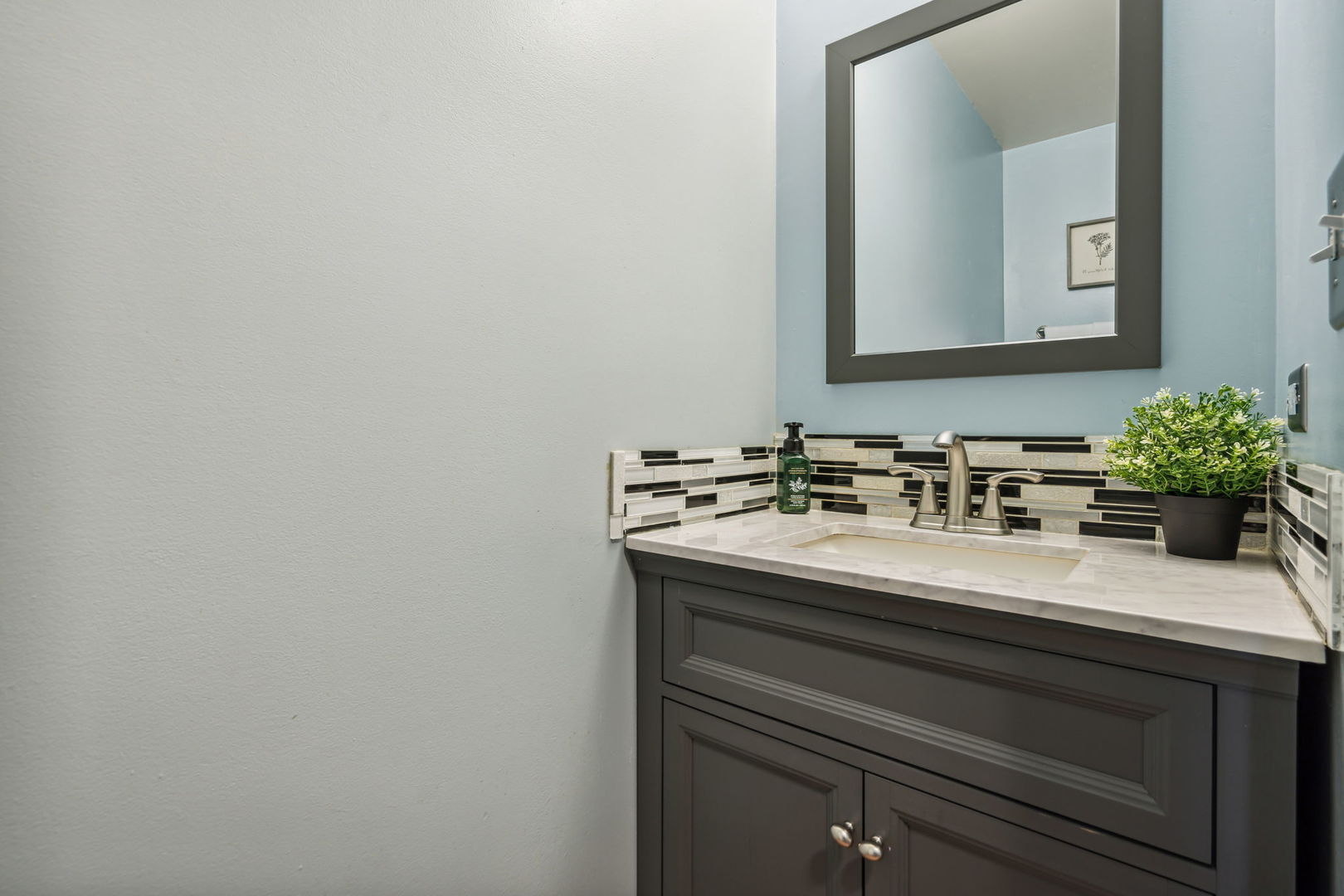 238 Ironbark Way Bolingbrook, IL 60440 - Photo 16 of 21 a bathroom with a sink and a mirror