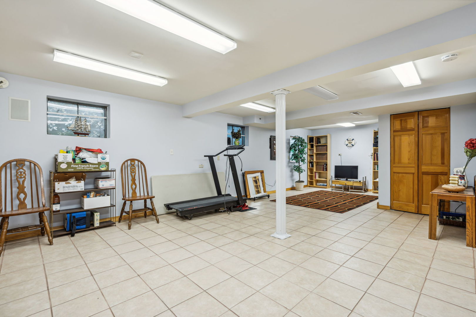 238 Ironbark Way Bolingbrook, IL 60440 - Photo 17 of 21 a view of a workspace with furniture and a livingroom