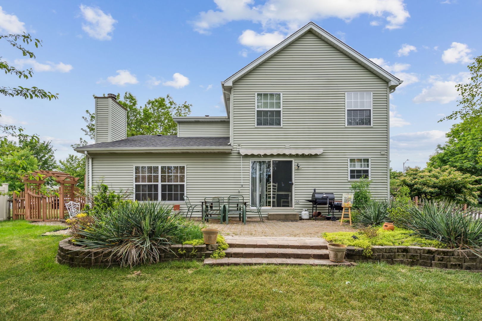 238 Ironbark Way Bolingbrook, IL 60440 - Photo 18 of 21 a front view of a house with a yard