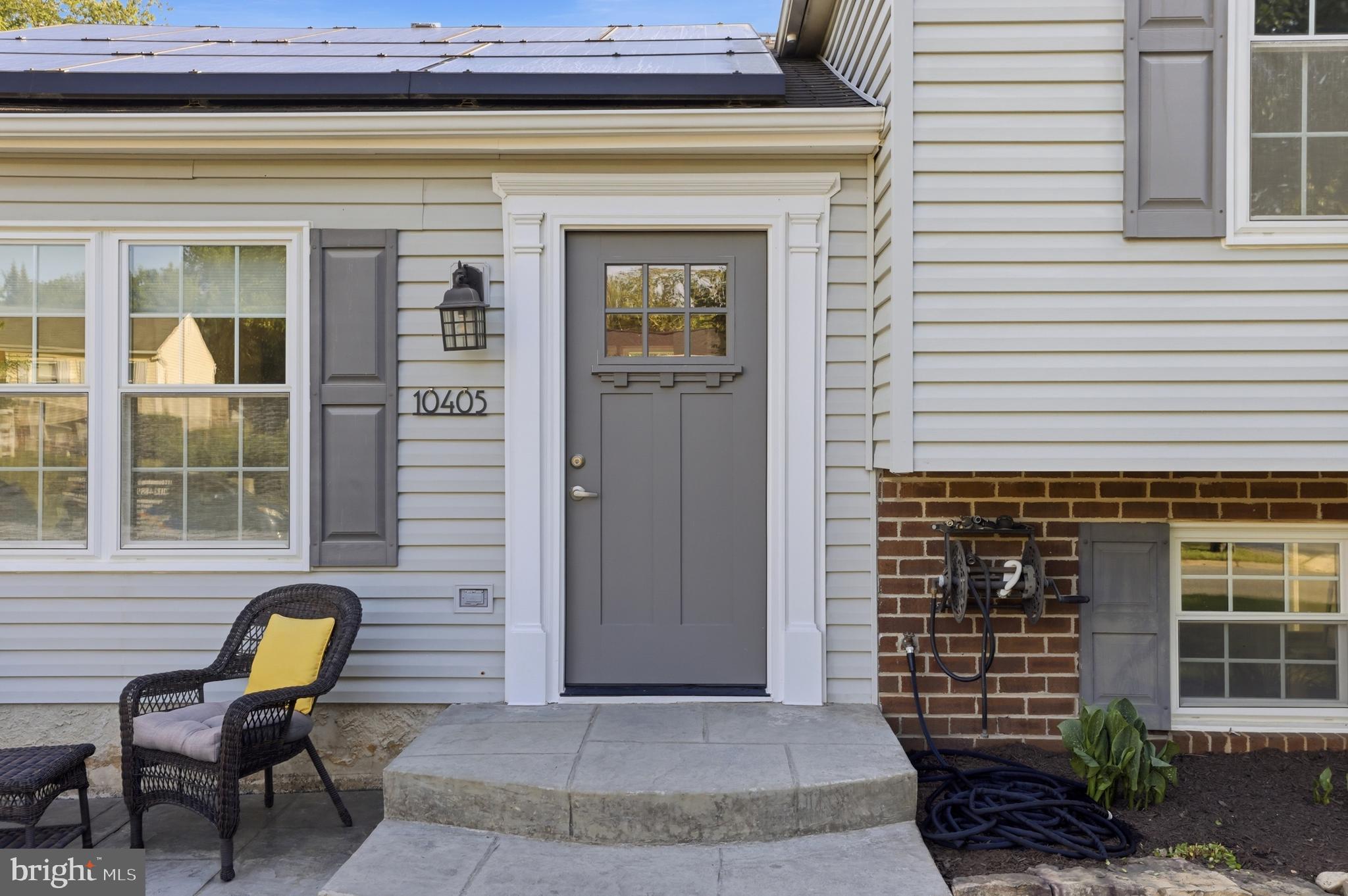 10405 Carlyn Ridge Road Damascus, MD 20872 - Photo 5 of 56 a front view of a house with outdoor seating