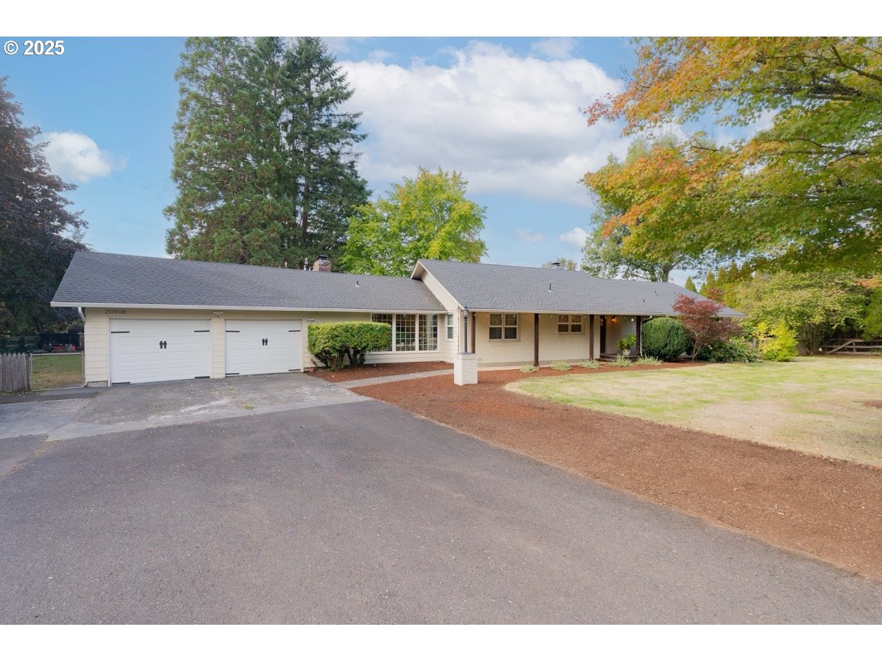 20908 Northeast 67th Avenue Battle Ground, WA 98604 - Photo 1 of 47 a front view of a house with a yard and garage