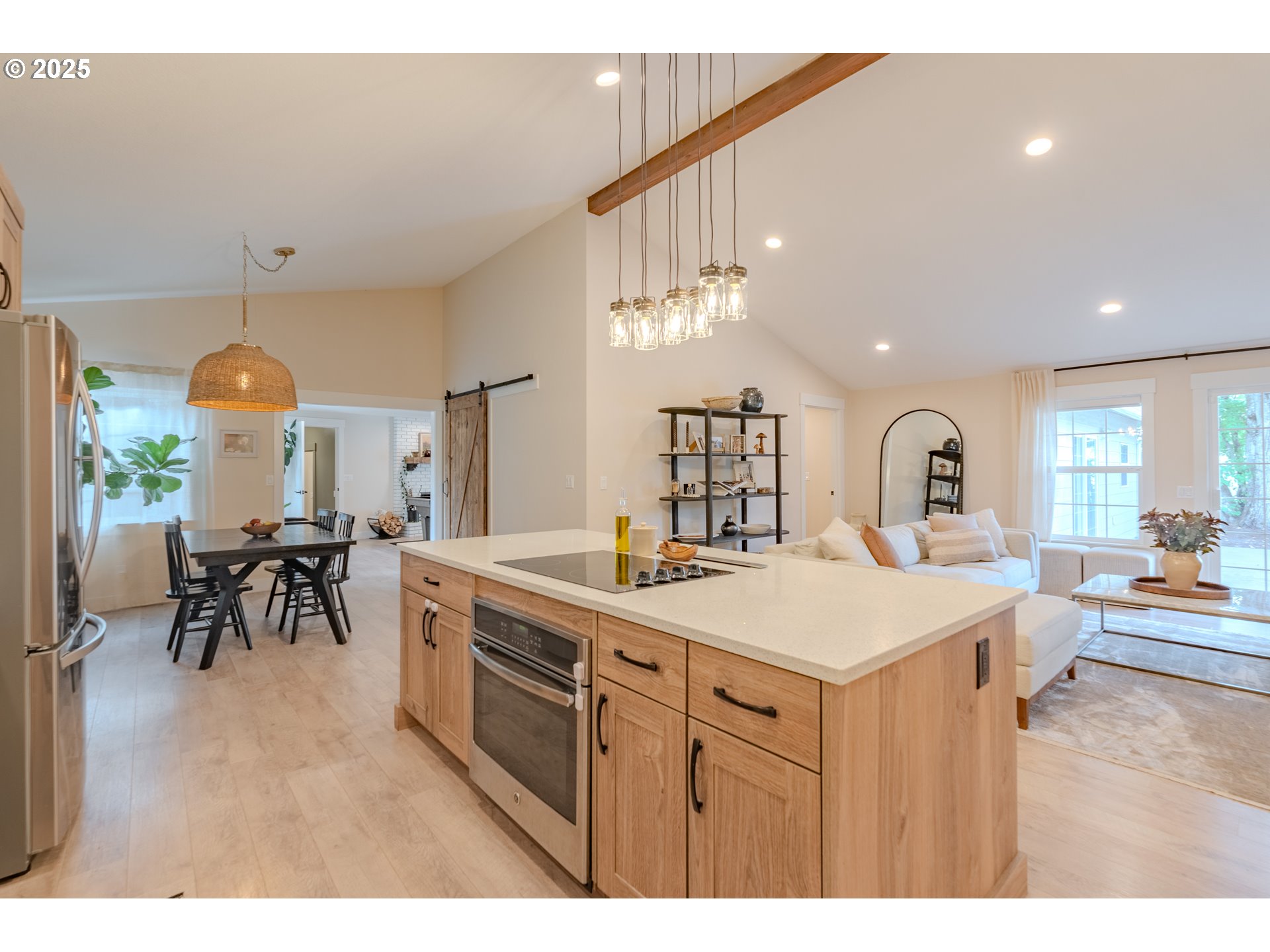 20908 Northeast 67th Avenue Battle Ground, WA 98604 - Photo 11 of 47 a large kitchen with a table and chairs