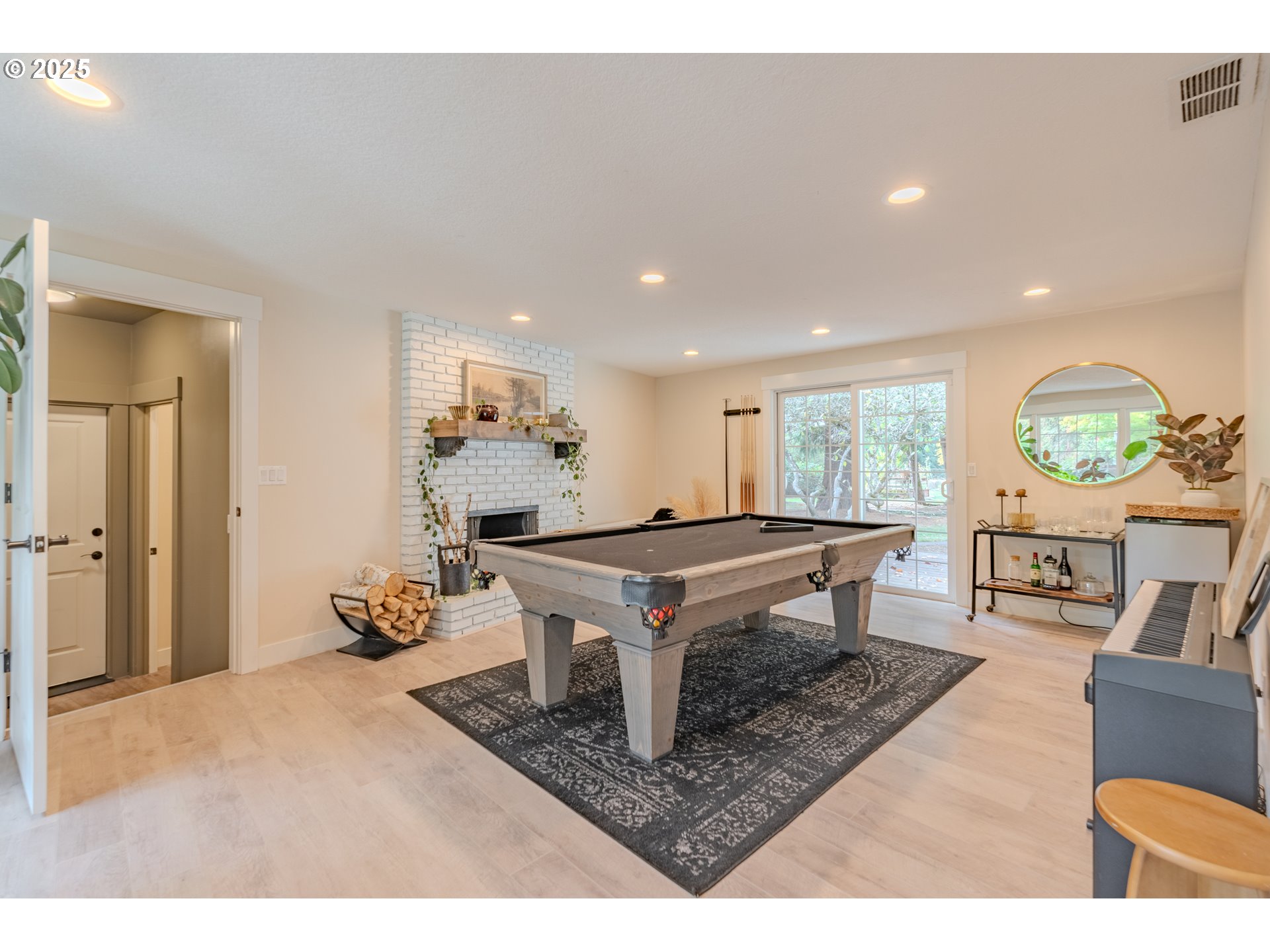 20908 Northeast 67th Avenue Battle Ground, WA 98604 - Photo 13 of 47 a living room with furniture and a wooden floor