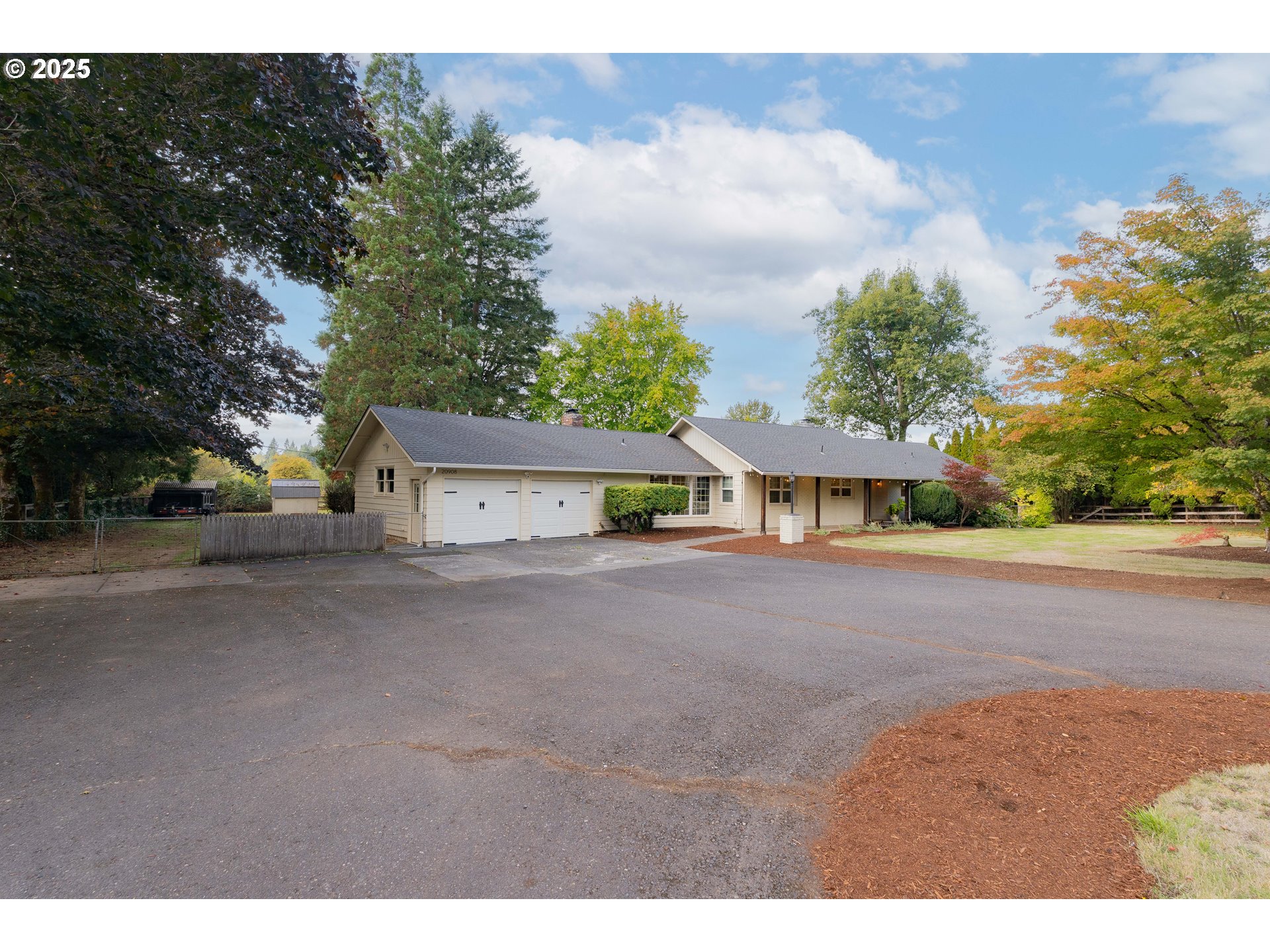 20908 Northeast 67th Avenue Battle Ground, WA 98604 - Photo 2 of 47 a view of a house with a yard and large trees