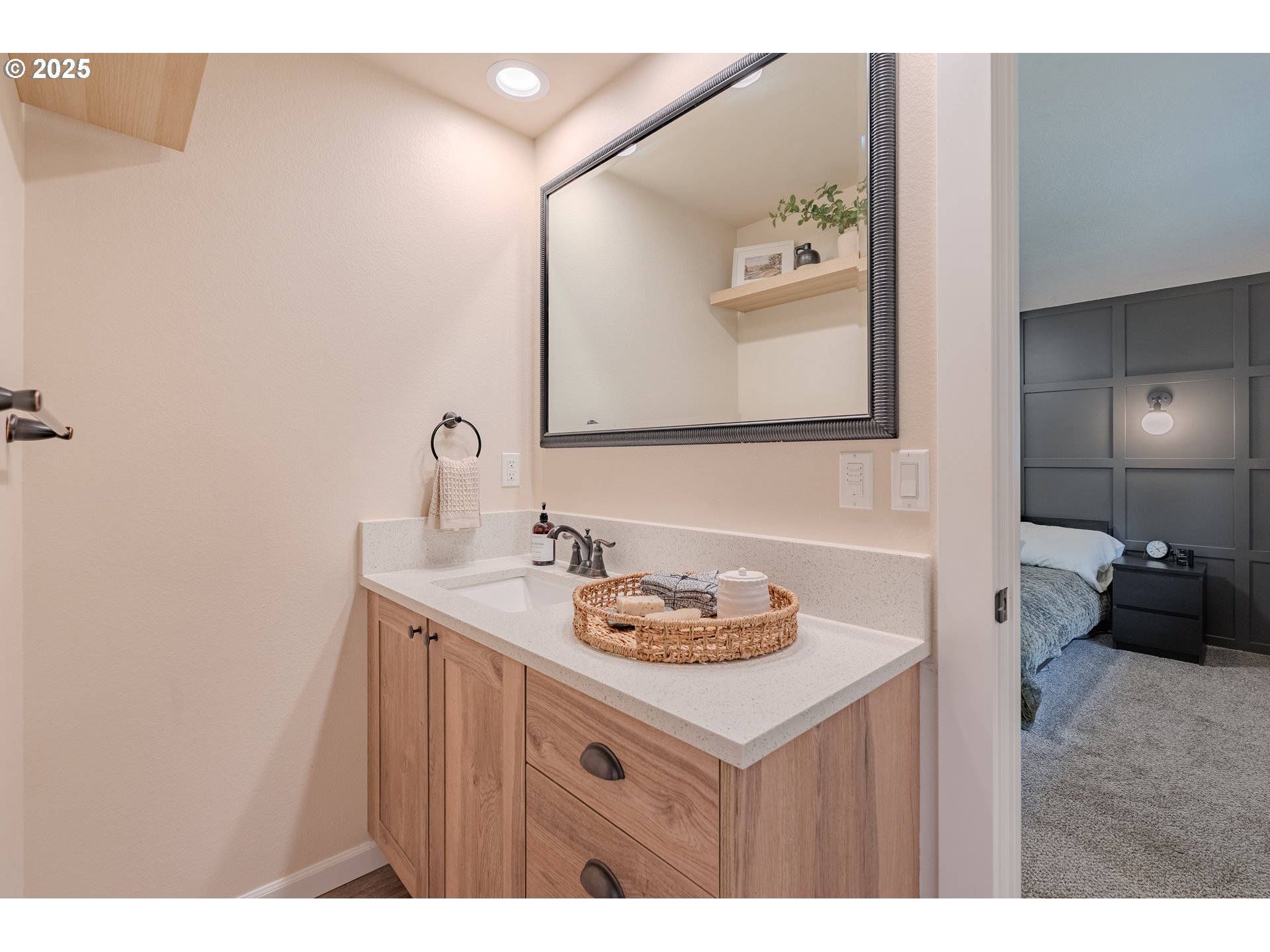 20908 Northeast 67th Avenue Battle Ground, WA 98604 - Photo 25 of 47 a bathroom with a sink and a mirror