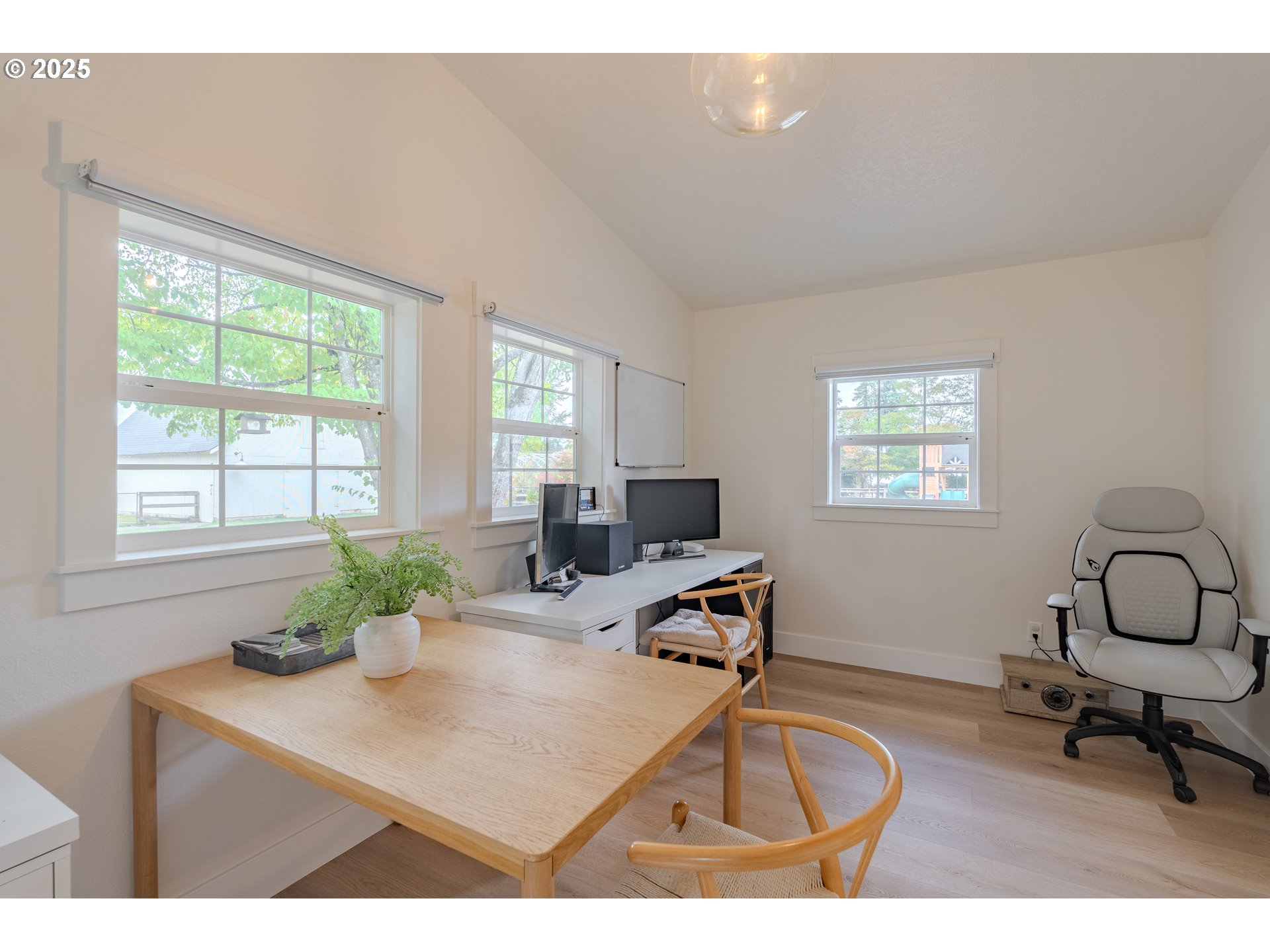 20908 Northeast 67th Avenue Battle Ground, WA 98604 - Photo 29 of 47 a view of a workspace with furniture and a window