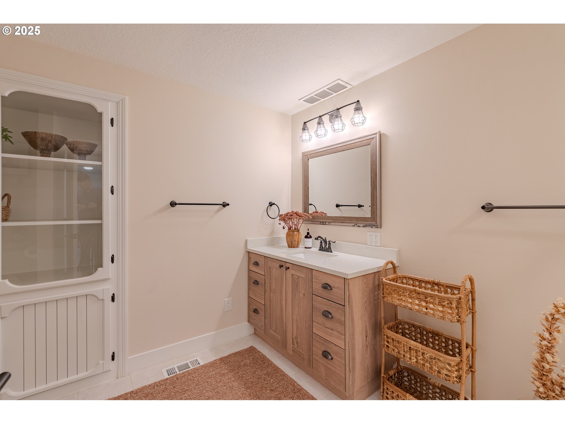 20908 Northeast 67th Avenue Battle Ground, WA 98604 - Photo 30 of 47 a bathroom with a sink a mirror and a toilet
