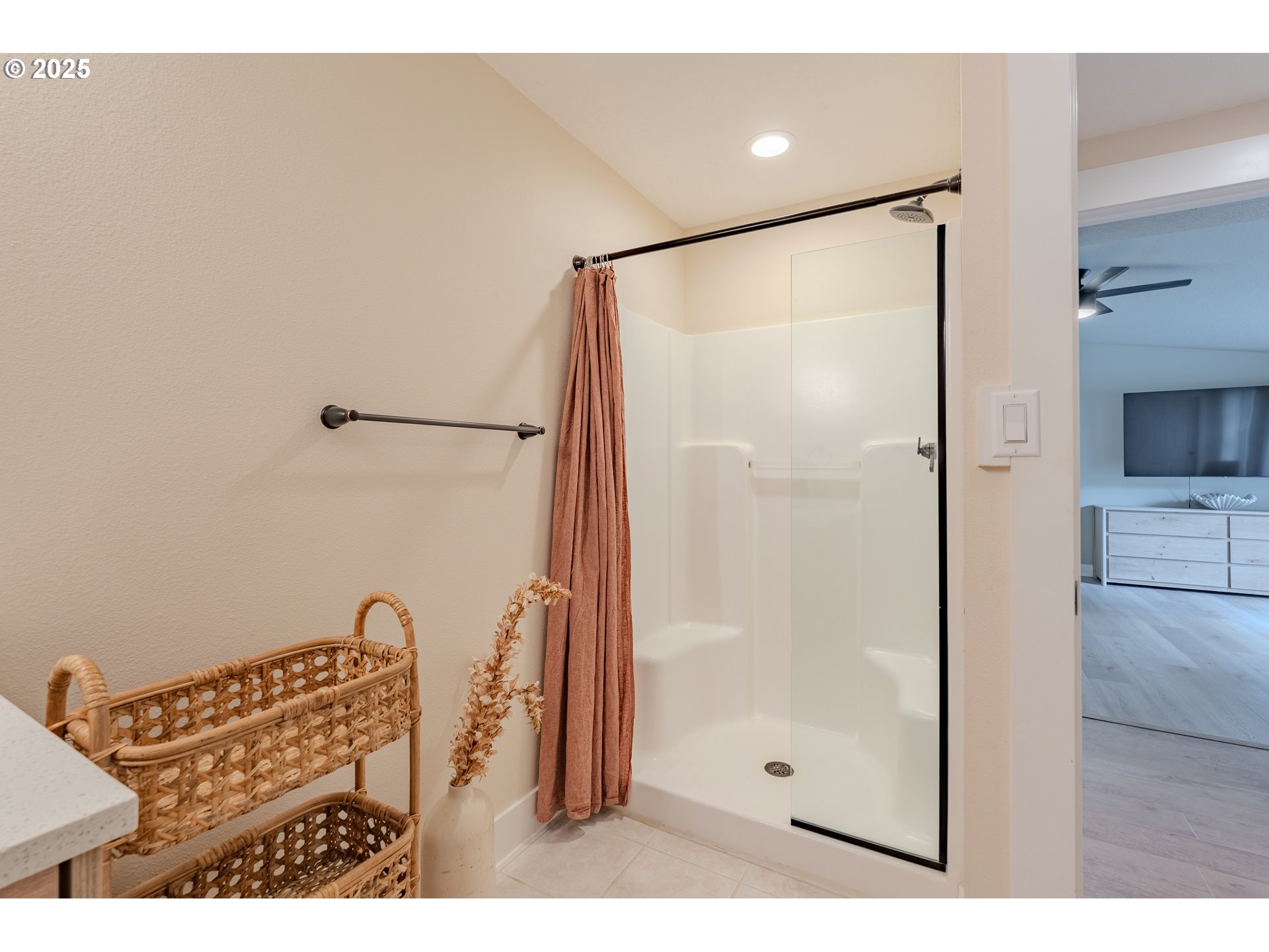 20908 Northeast 67th Avenue Battle Ground, WA 98604 - Photo 31 of 47 a bathroom with a glass shower door