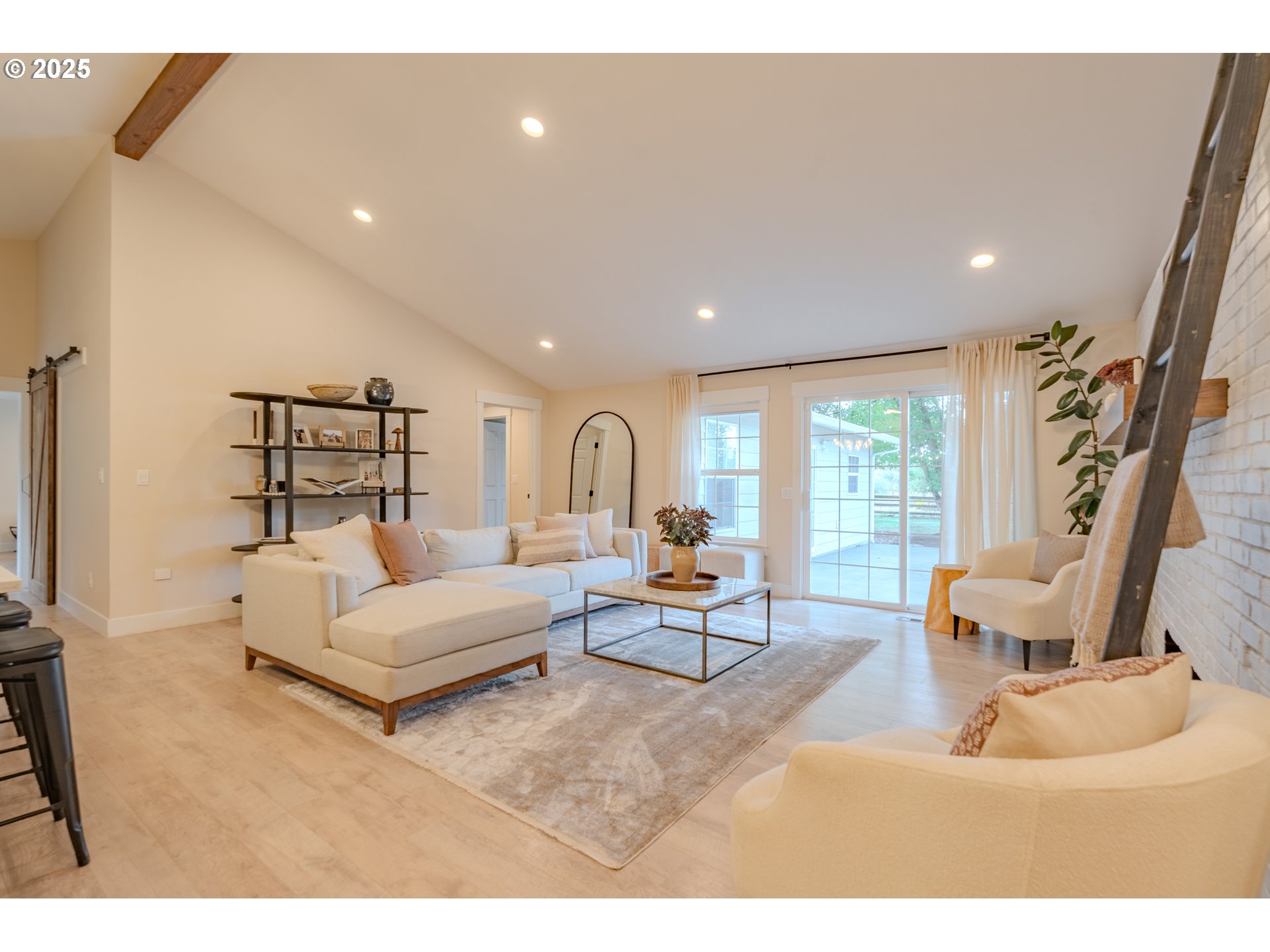 20908 Northeast 67th Avenue Battle Ground, WA 98604 - Photo 6 of 47 a living room with furniture and a large window