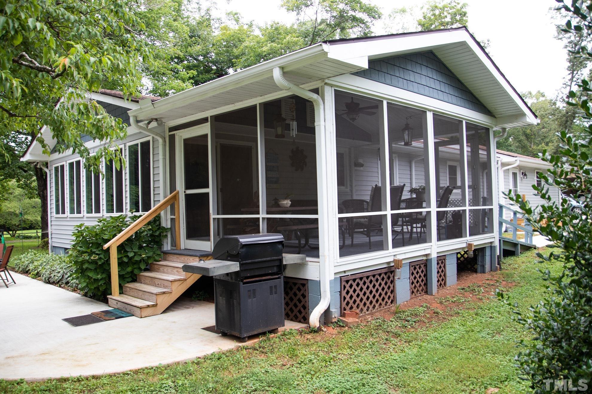 70 Waters Edge Loop Henderson, NC 27537 - Photo 2 of 49 a view of backyard with deck and outdoor seating
