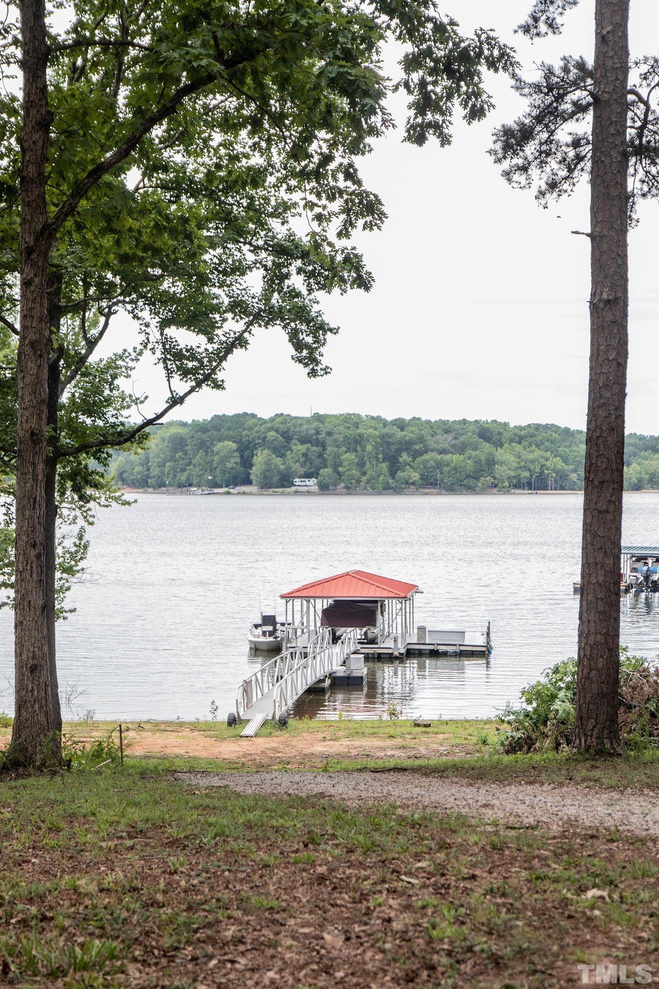 70 Waters Edge Loop Henderson, NC 27537 - Photo 3 of 49 a view of lake with green space