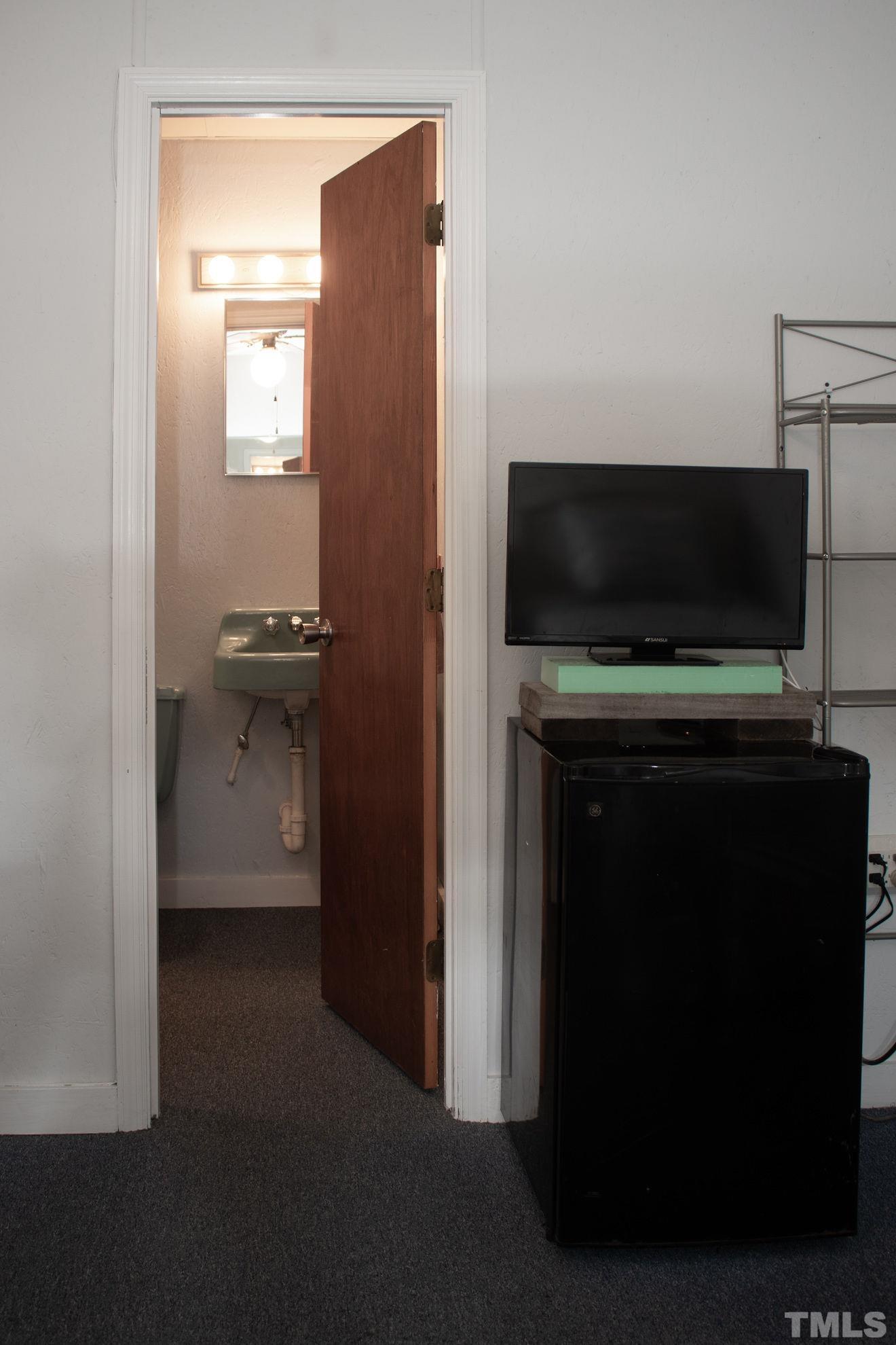 70 Waters Edge Loop Henderson, NC 27537 - Photo 33 of 49 a view of kitchen living room