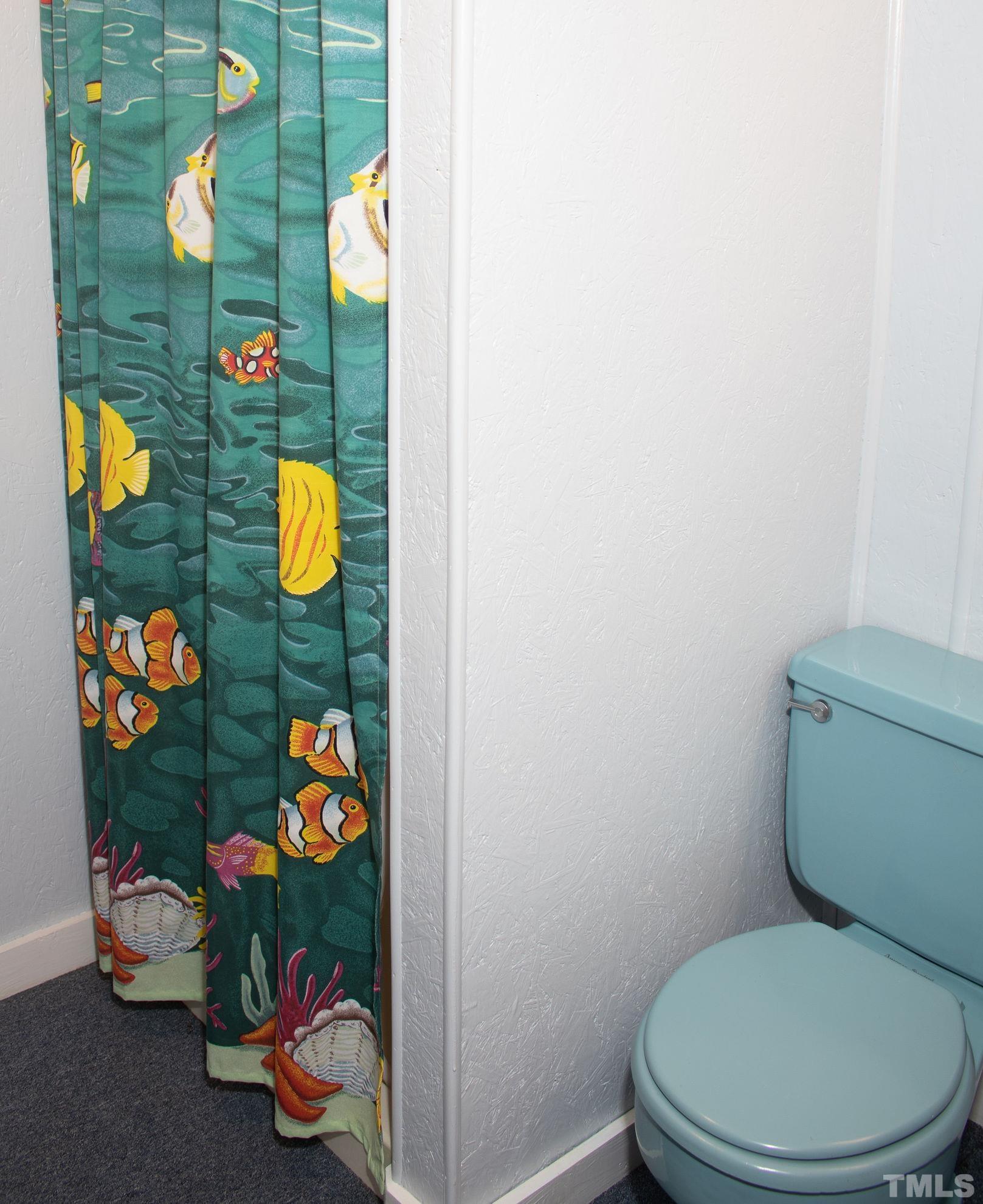 70 Waters Edge Loop Henderson, NC 27537 - Photo 34 of 49 a bathroom with a toilet and sink