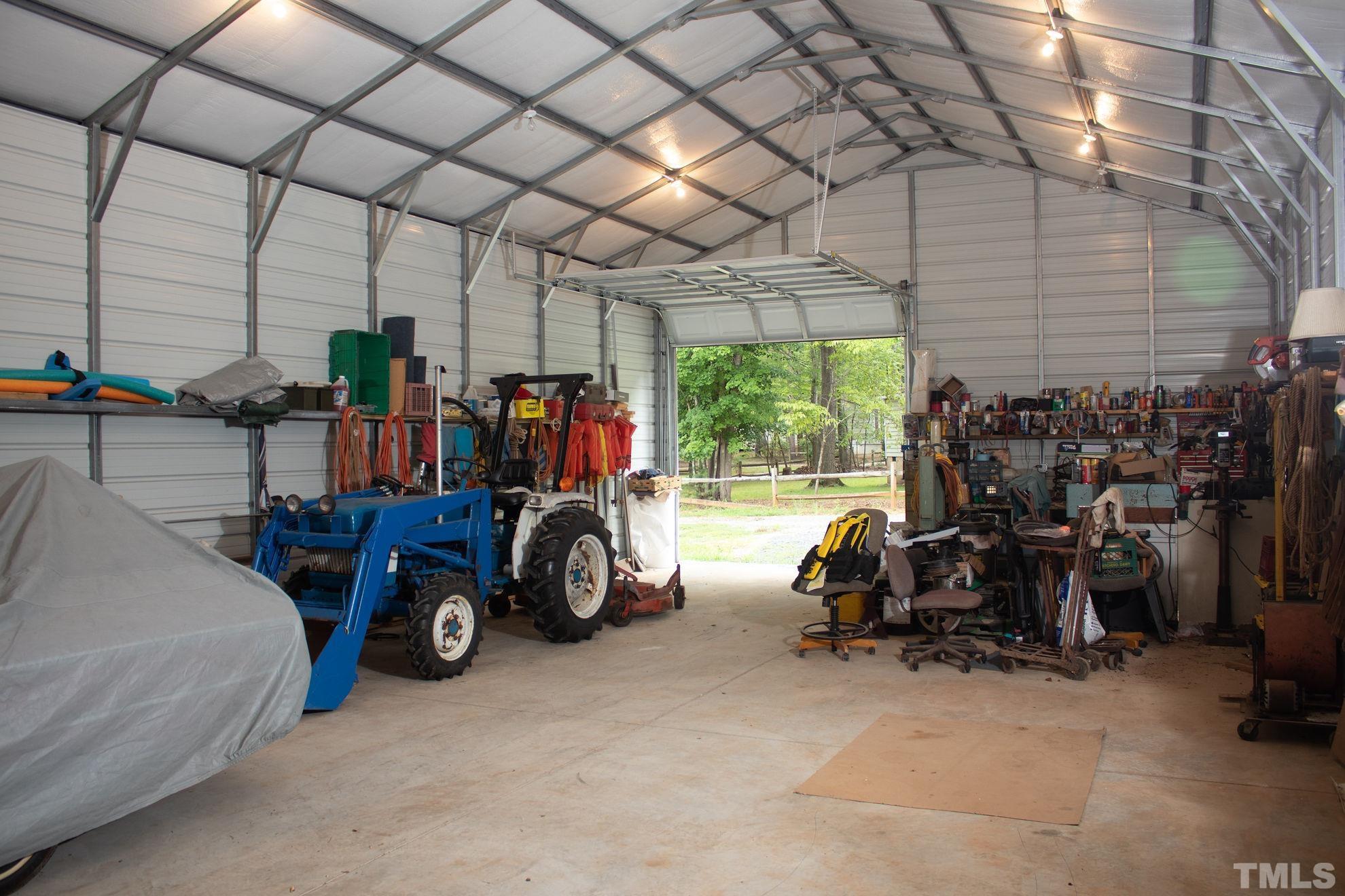 70 Waters Edge Loop Henderson, NC 27537 - Photo 41 of 49 a view of car garage