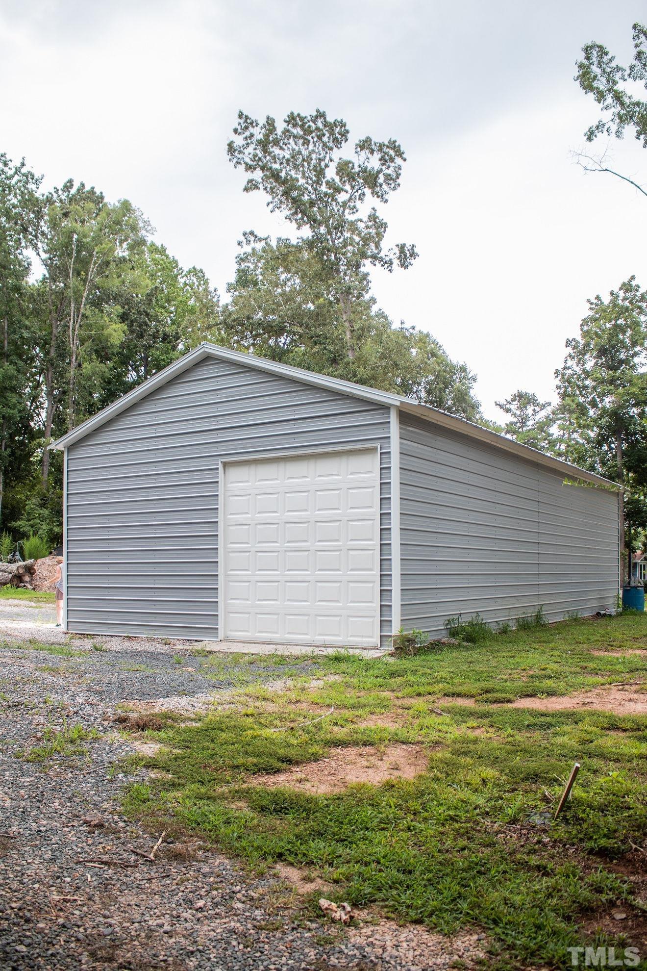 70 Waters Edge Loop Henderson, NC 27537 - Photo 42 of 49 a view of a house with a yard