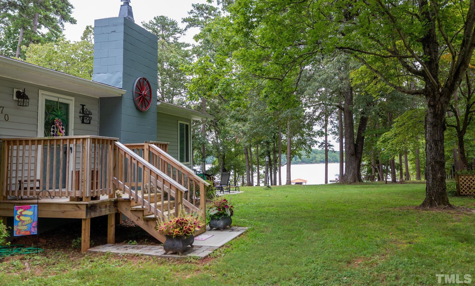 70 Waters Edge Loop Henderson, NC 27537 - Photo 7 of 49 a view of a house with a yard