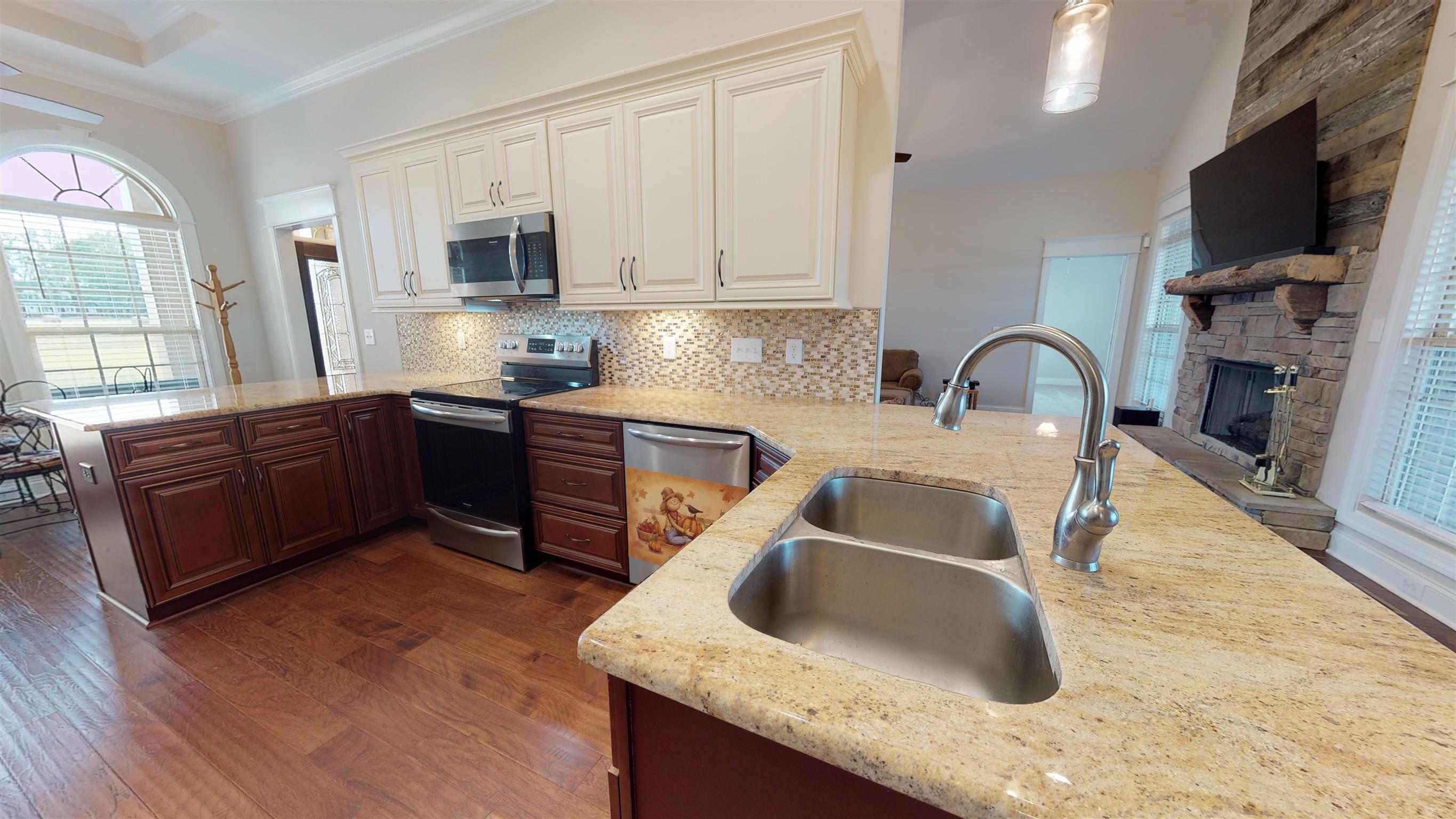 2600 Midland Fosterville Road Bell Buckle, TN 37020 - Photo 11 of 30 Kitchen with soft close cabinets and smart lighting