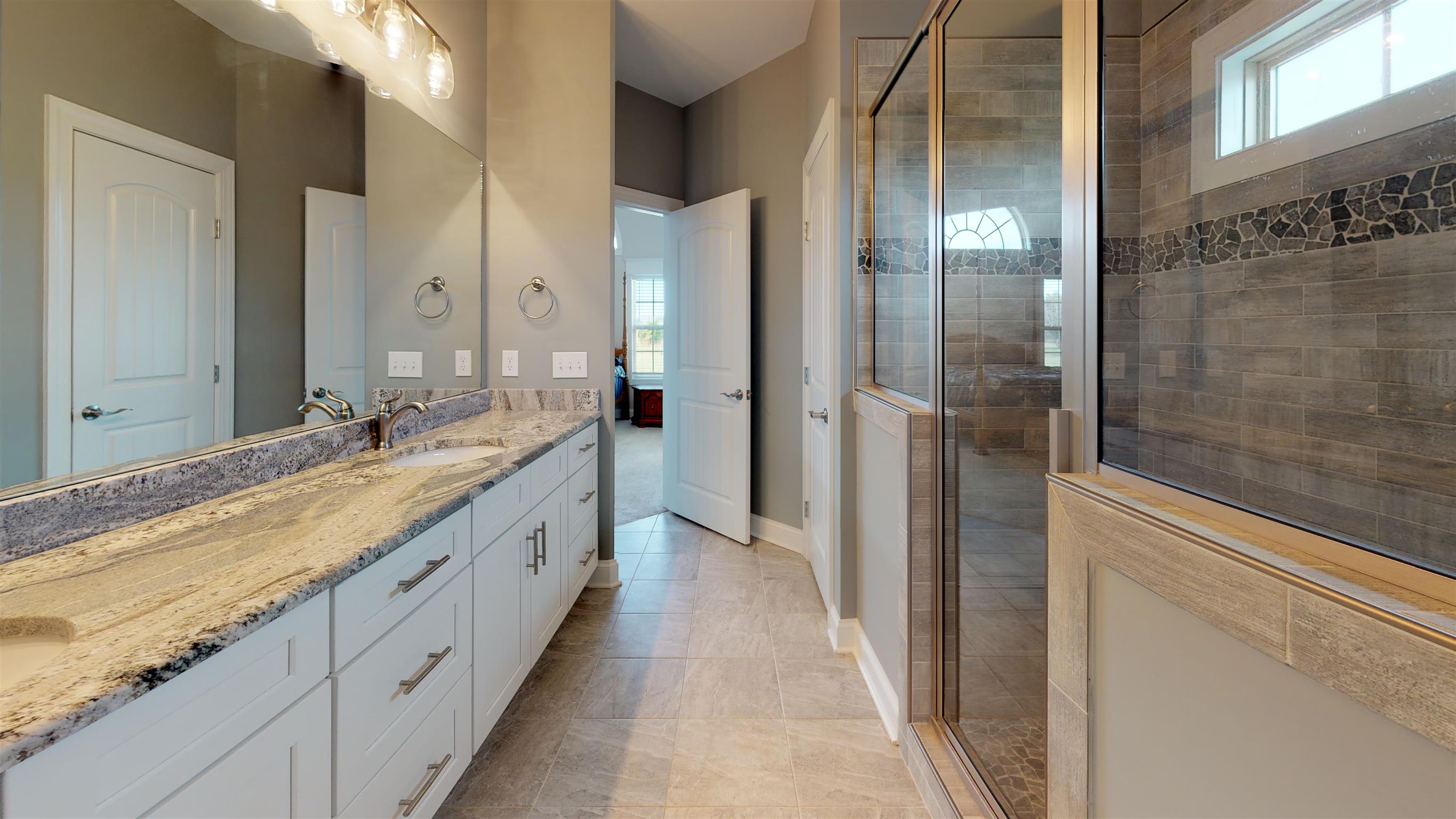 2600 Midland Fosterville Road Bell Buckle, TN 37020 - Photo 19 of 30 Gorgeous master bathroom with double vanities, spacious shower, and private commode
