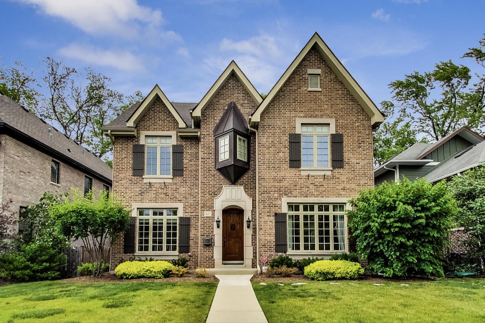 827 South Chester Avenue Park Ridge, IL 60068 - Photo 1 of 38 a front view of a house with a yard