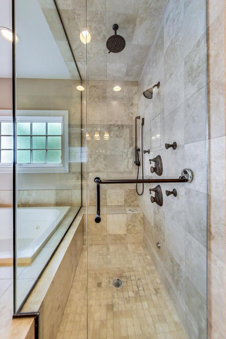 827 South Chester Avenue Park Ridge, IL 60068 - Photo 20 of 38 a bathroom with a shower and mirror