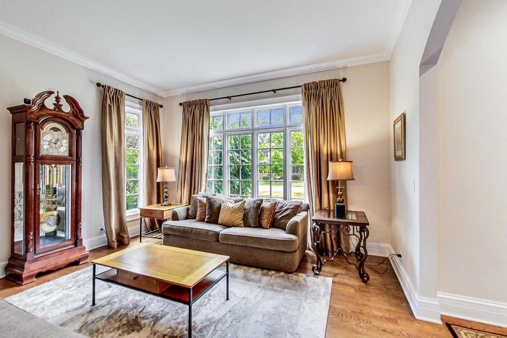 827 South Chester Avenue Park Ridge, IL 60068 - Photo 3 of 38 a living room with furniture and a large window