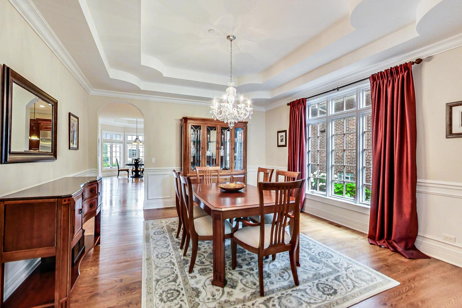 827 South Chester Avenue Park Ridge, IL 60068 - Photo 5 of 38 a view of a dining room with furniture window and wooden floor