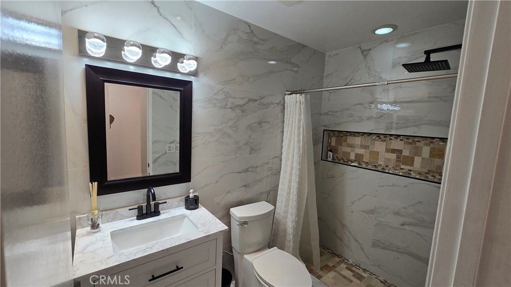 25657 Almendra Drive Valencia, CA 91355 - Photo 8 of 14 HALLWAY BATHROOM