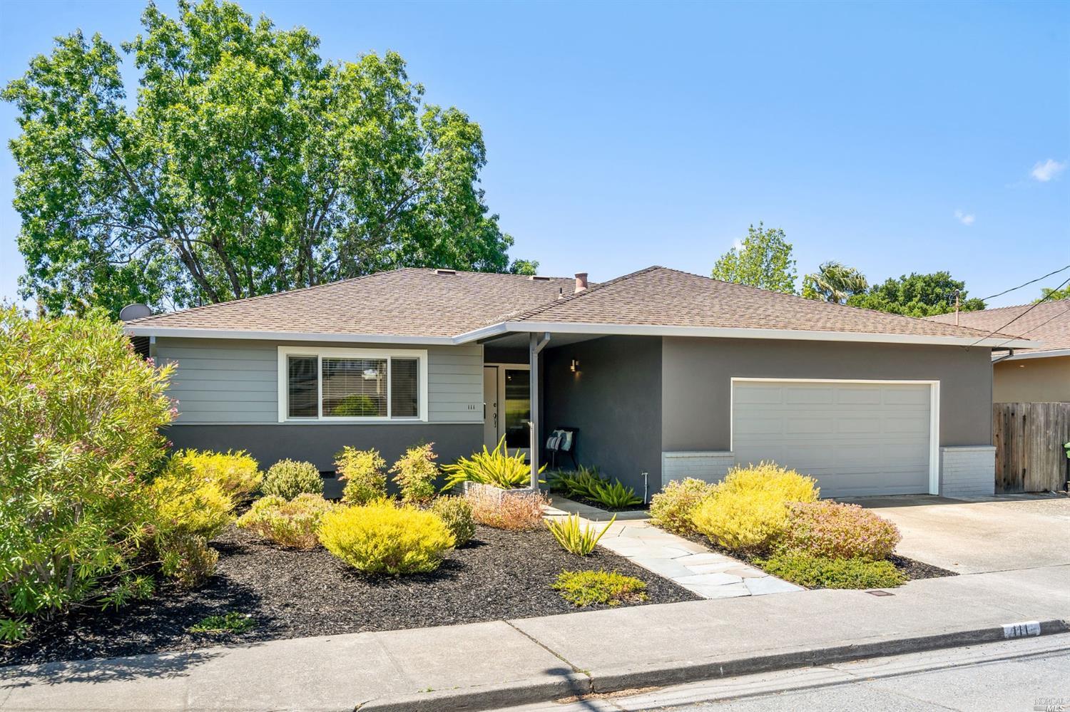 a front view of a house with yellow lighting