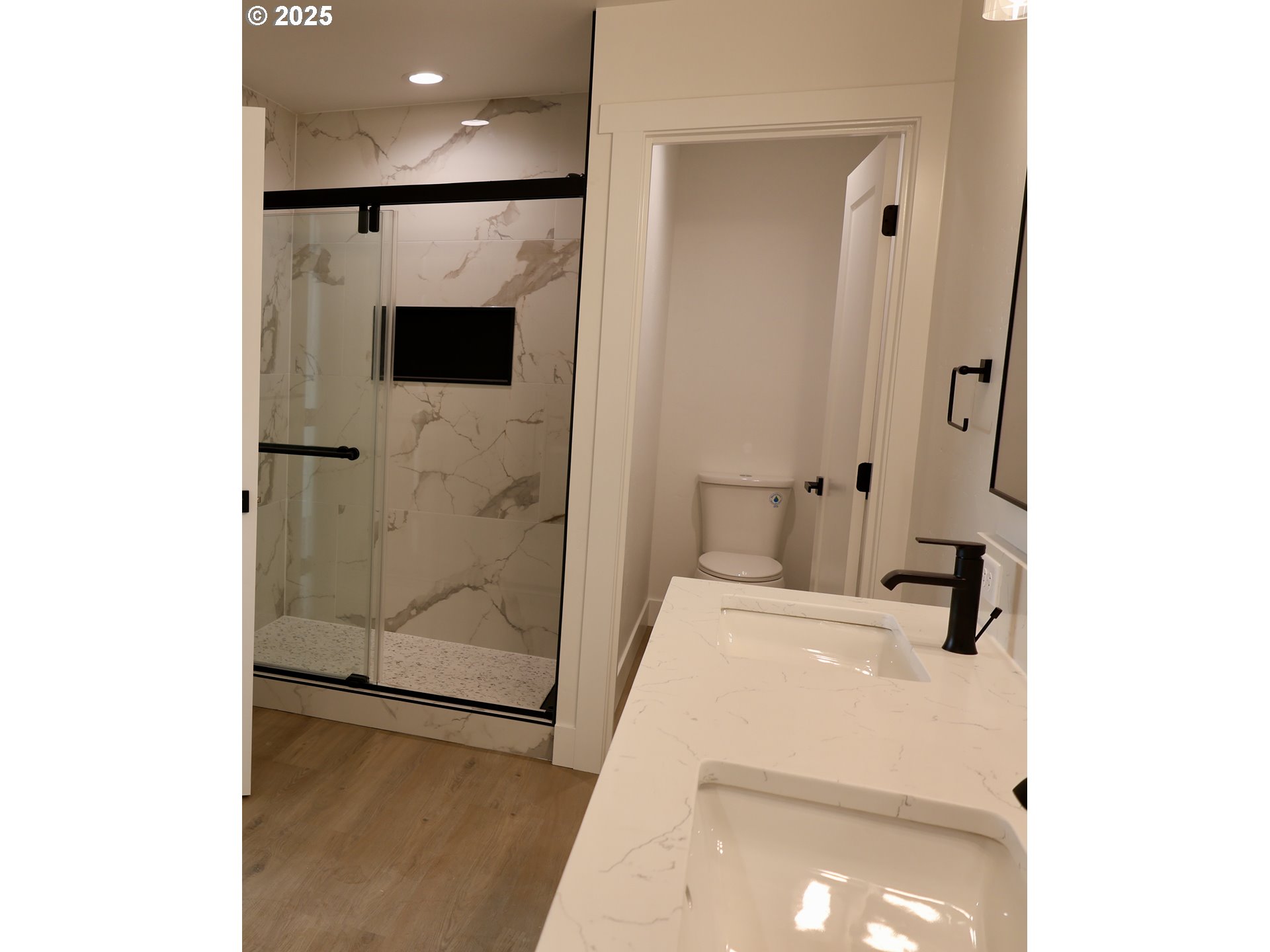 1750 Northeast 8th Place Hermiston, OR 97838 - Photo 12 of 21 a bathroom with a sink a toilet and shower