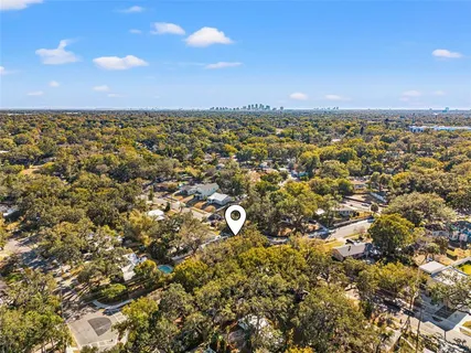 a view of a city with lots of trees