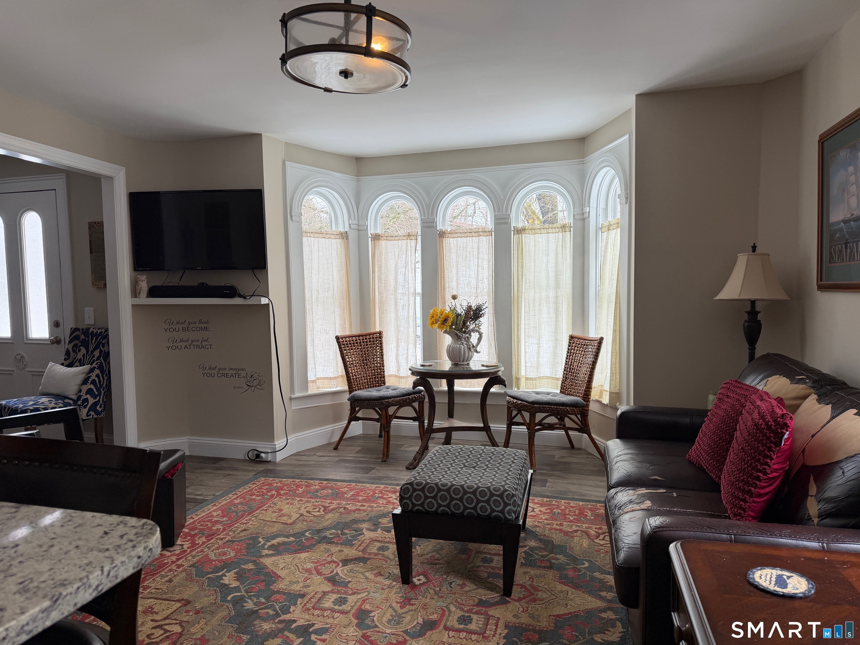 48 Wrights Crossing Road Pomfret, CT 06259 - Photo 3 of 12 a living room with furniture fireplace and a flat screen tv