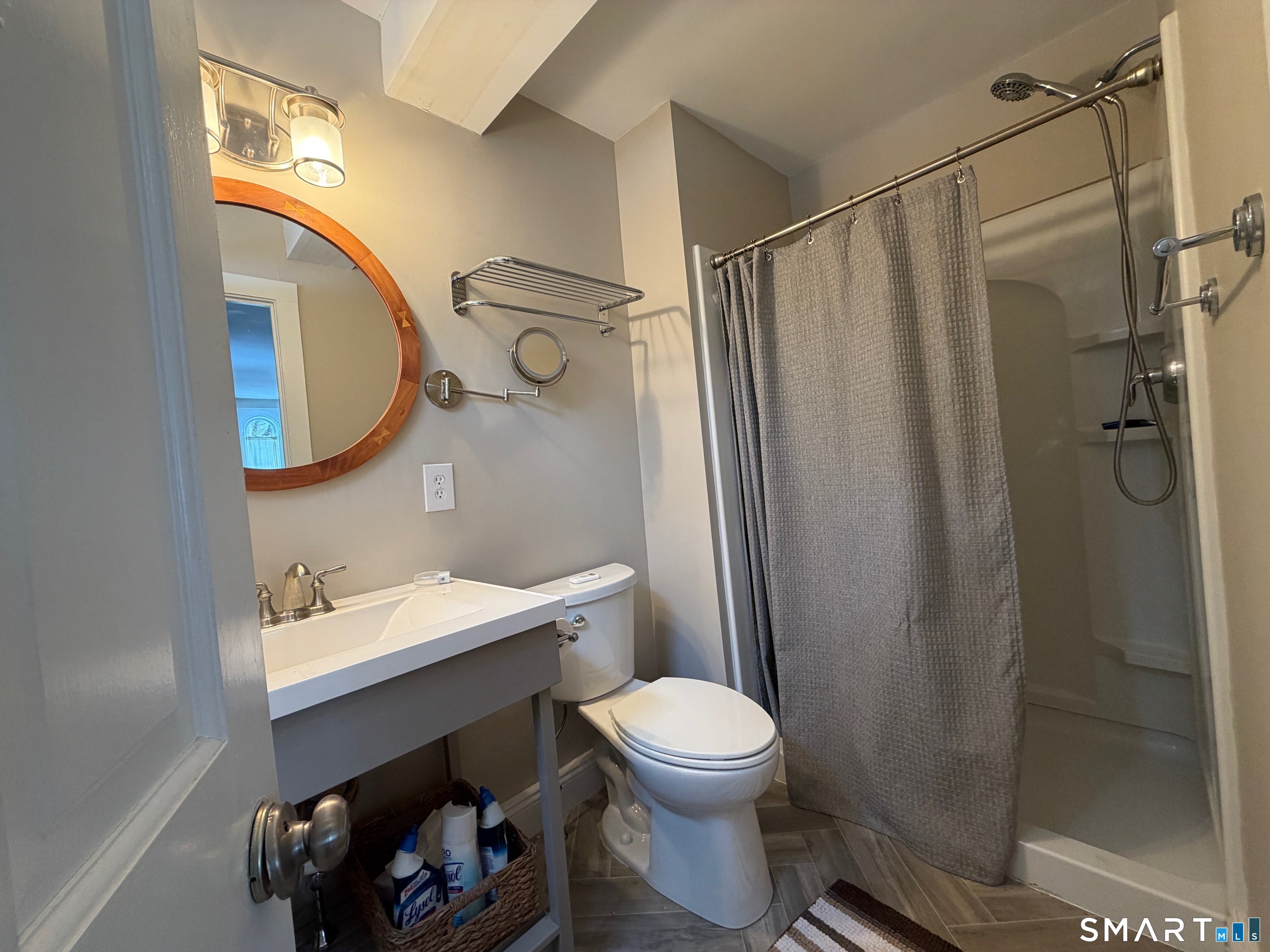 48 Wrights Crossing Road Pomfret, CT 06259 - Photo 7 of 12 a bathroom with a sink a toilet and shower