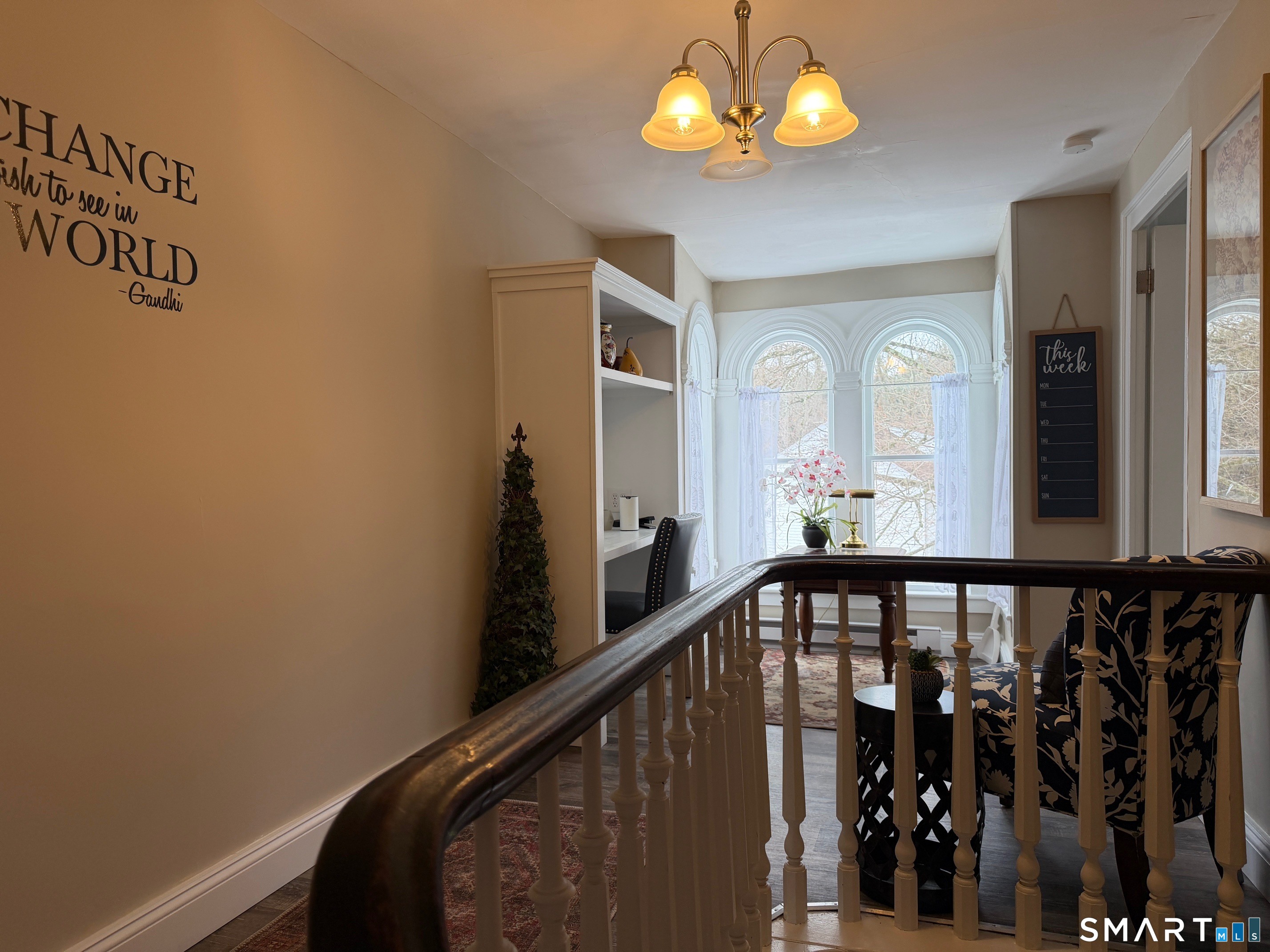 48 Wrights Crossing Road Pomfret, CT 06259 - Photo 8 of 12 a view of a hallway with wooden floor and staircase