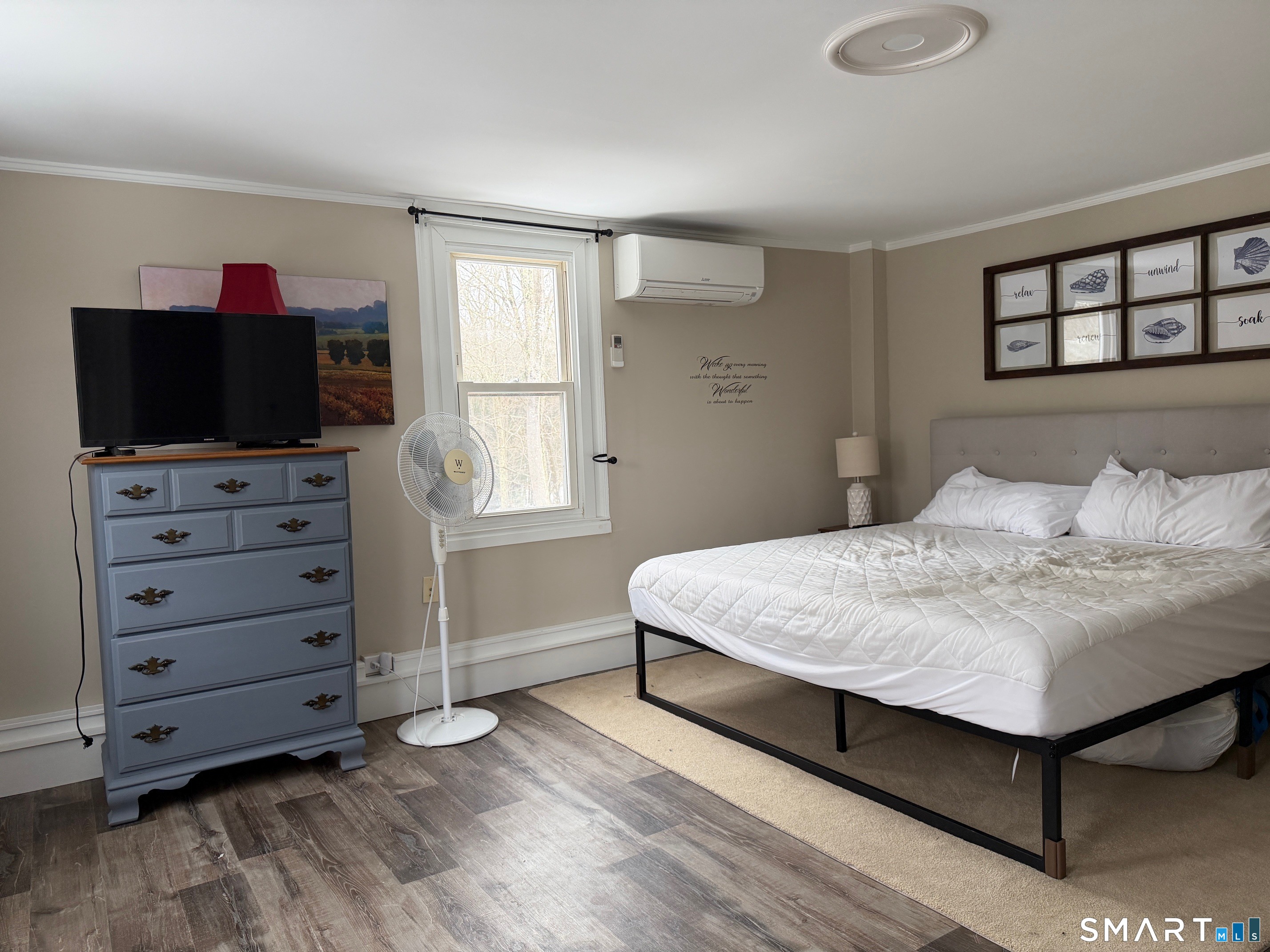 48 Wrights Crossing Road Pomfret, CT 06259 - Photo 10 of 12 a bedroom with a bed and a flat screen tv