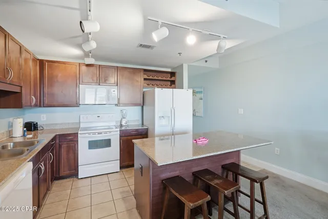 $264,900 | 9860 Thomas Drive, Unit 127, Panama City, FL 32408