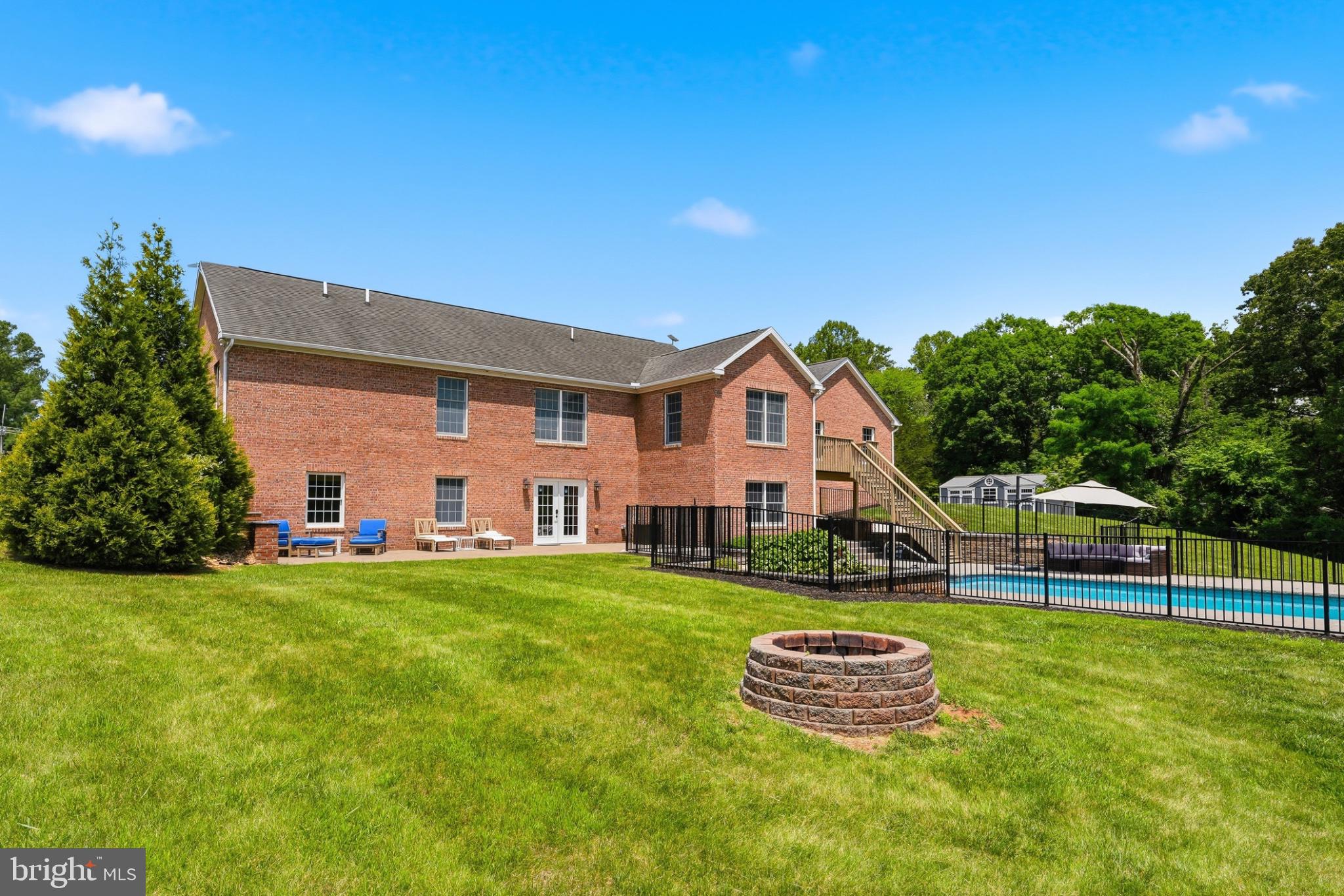 11337 Old Stillhouse Road Boston, VA 22713 - Photo 57 of 58 a view of a house with a backyard porch and sitting area