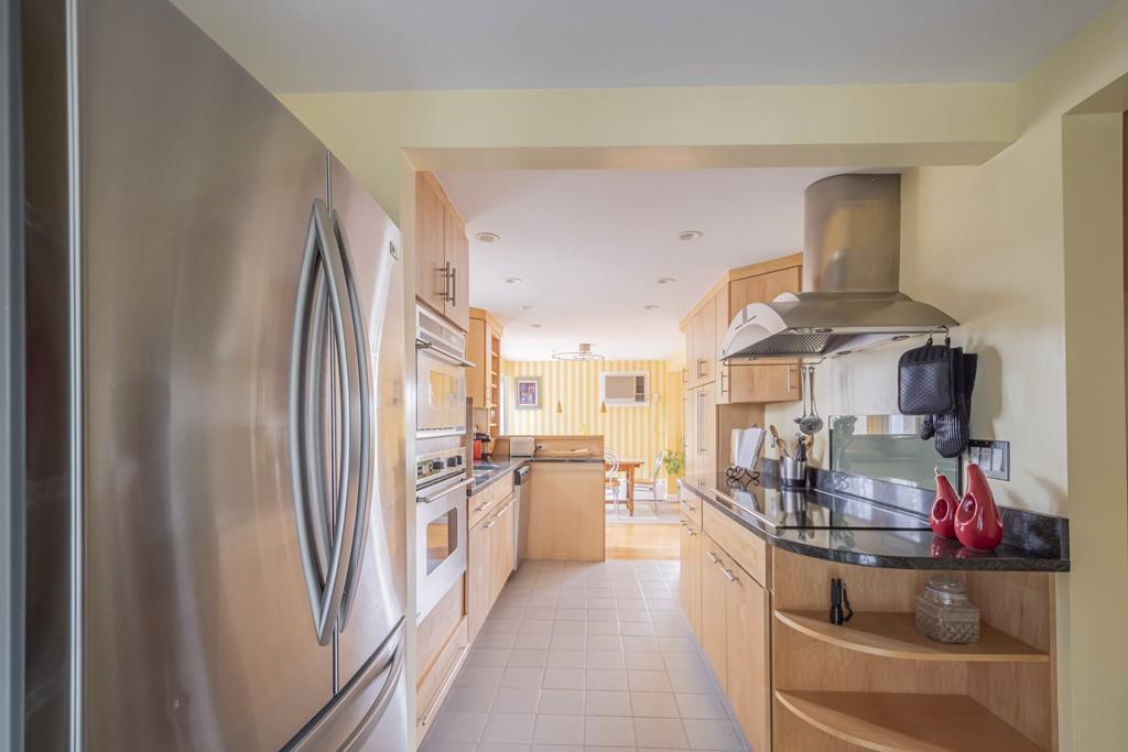 2 Great Rock Road Lexington, MA 02421 - Photo 12 of 42 a kitchen with stainless steel appliances a refrigerator and a stove