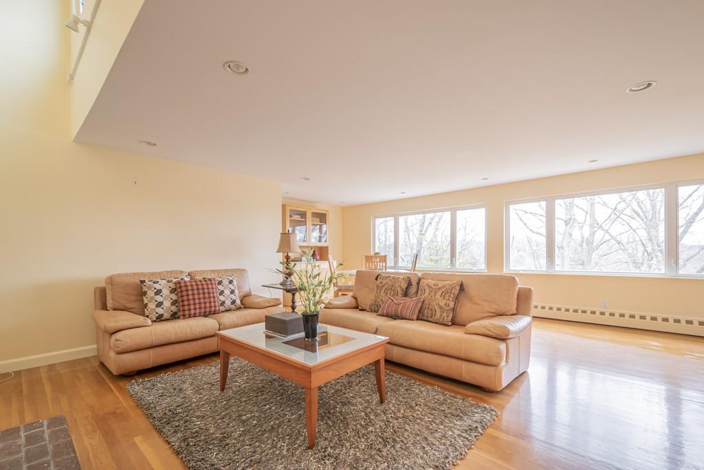 2 Great Rock Road Lexington, MA 02421 - Photo 17 of 42 a living room with furniture and a large window