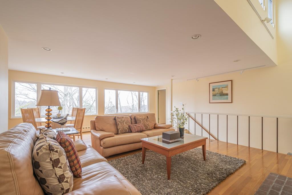 2 Great Rock Road Lexington, MA 02421 - Photo 18 of 42 a living room with furniture a rug and a large window