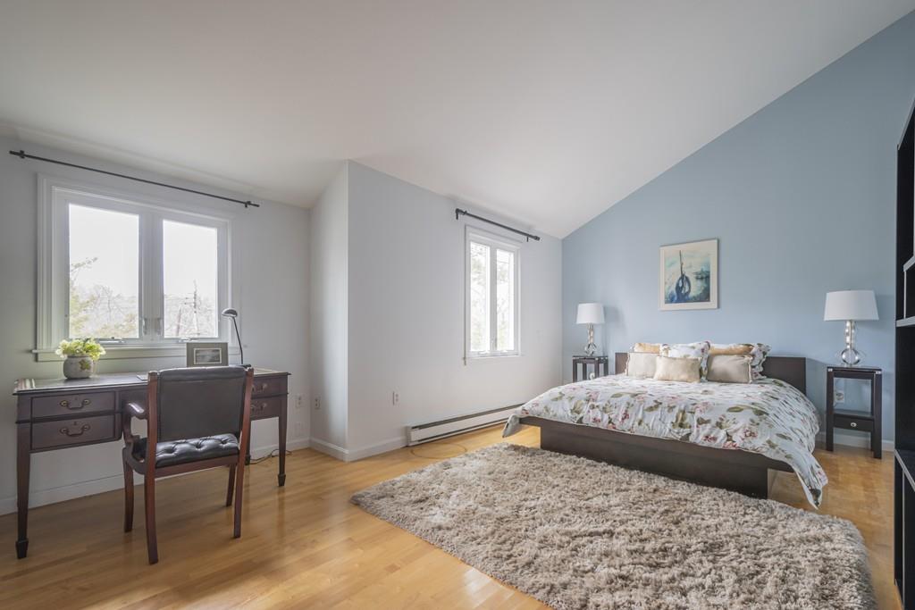 2 Great Rock Road Lexington, MA 02421 - Photo 23 of 42 a bedroom with a bed and a table in it