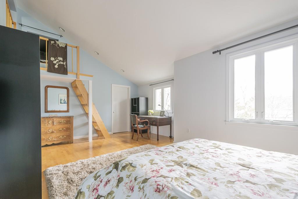 2 Great Rock Road Lexington, MA 02421 - Photo 25 of 42 a bedroom with a bed and wooden floor