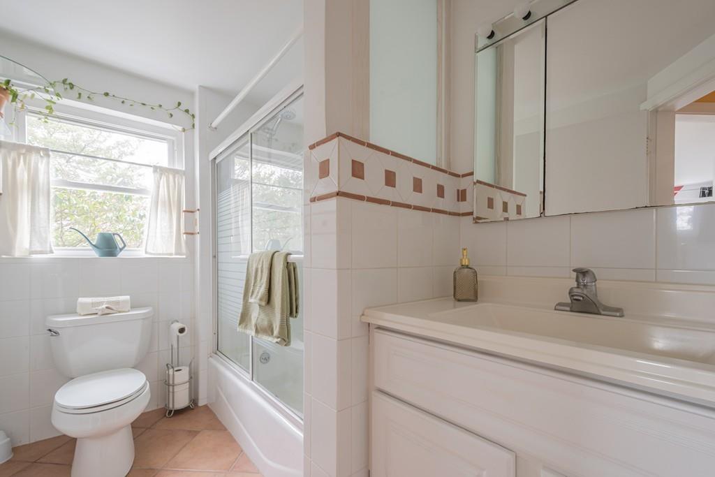 2 Great Rock Road Lexington, MA 02421 - Photo 34 of 42 a bathroom with a sink a toilet and a mirror