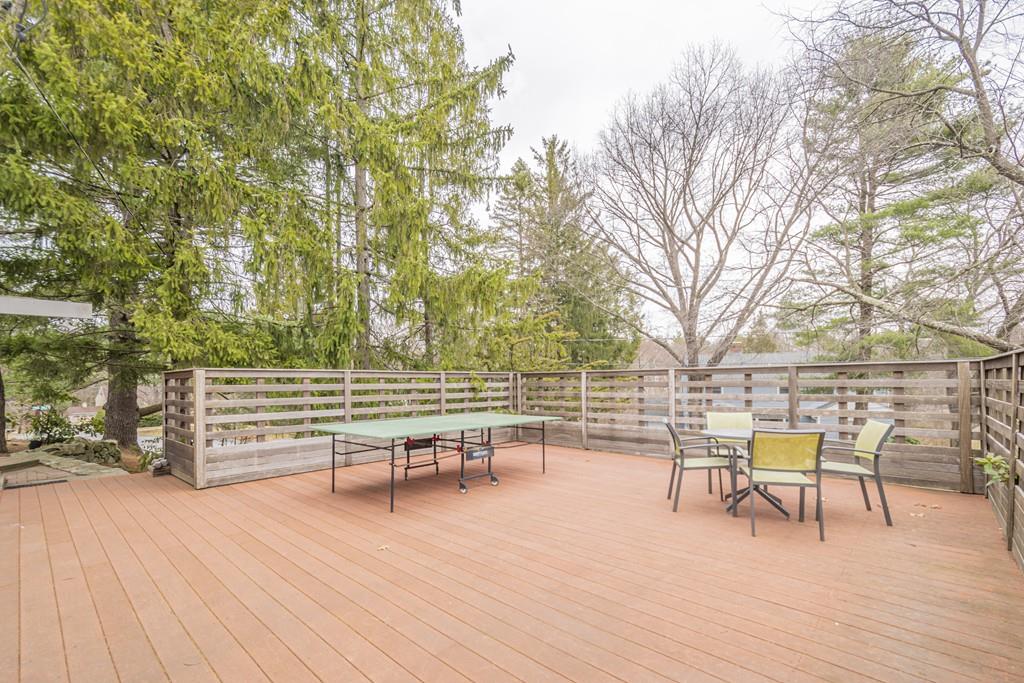 2 Great Rock Road Lexington, MA 02421 - Photo 40 of 42 a view of a chairs and tables in the patio next to a yard