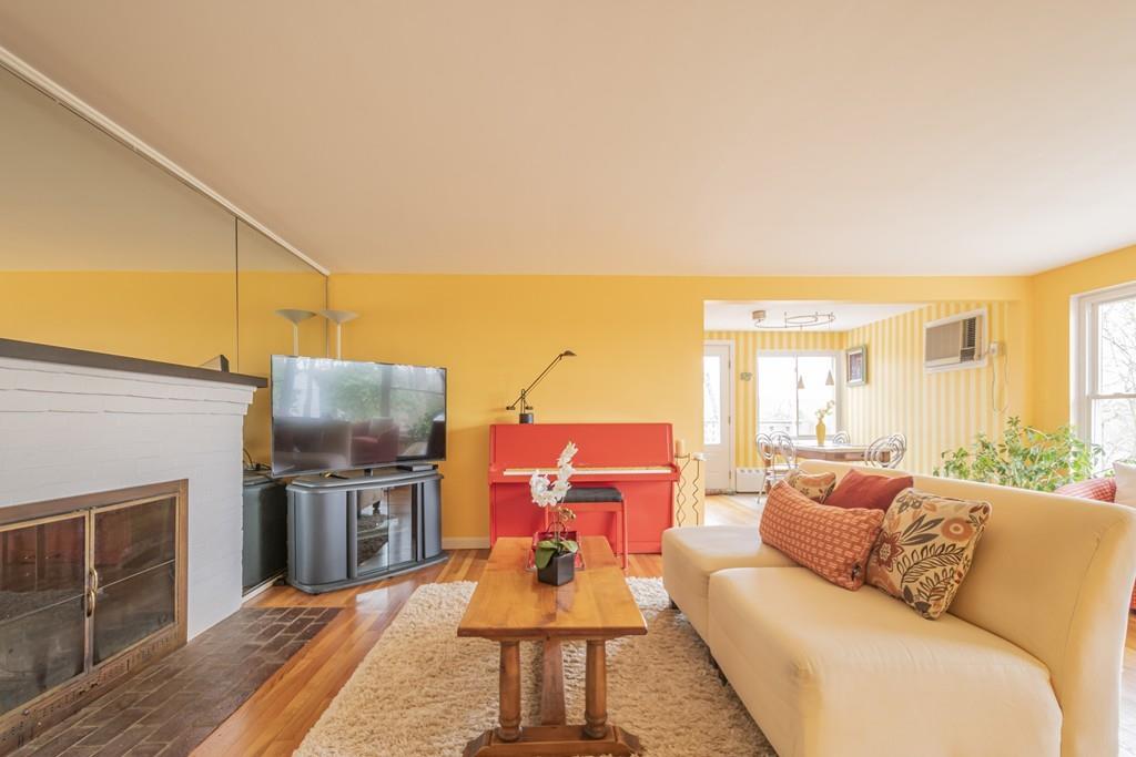 2 Great Rock Road Lexington, MA 02421 - Photo 8 of 42 a living room with furniture a large window and flat screen tv